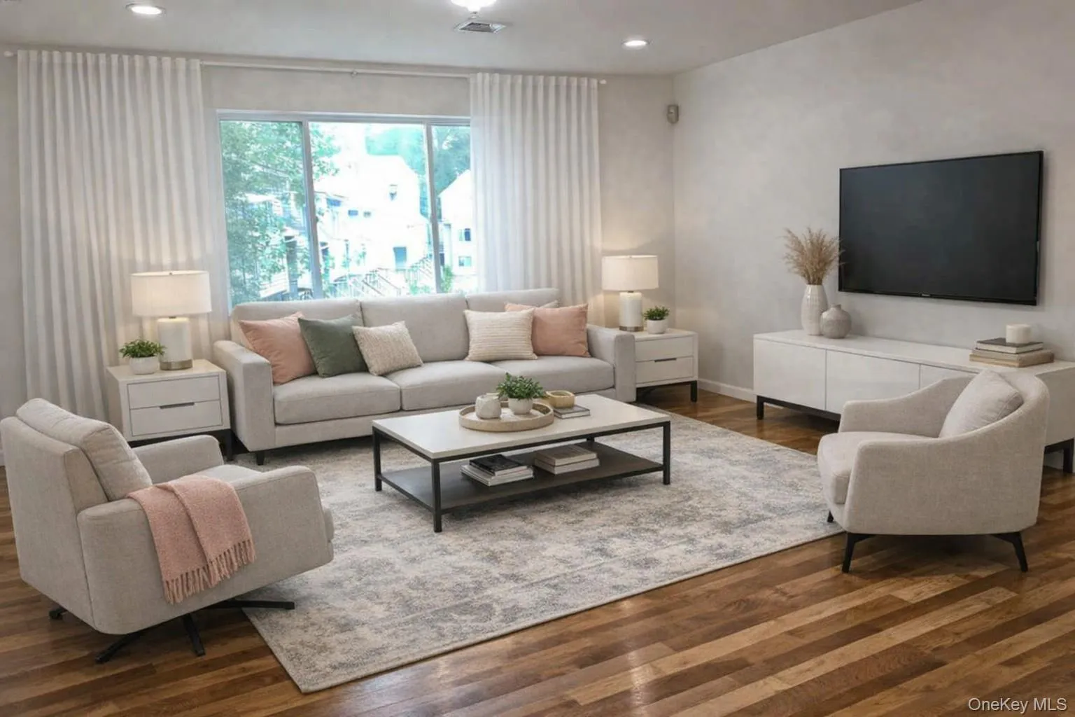 Spacious living room with recently refinished wood floors and a large picture window - opens to dining room. (Virtually stage) Spacious living room with recently refinished wood floors and a large picture window - opens to dining room. (Virtually stage)