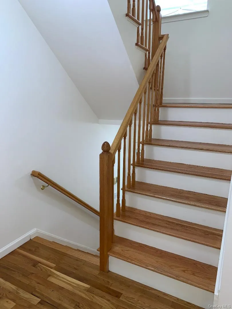 Stairs leading to upstairs (bedroom) level Stairs leading to upstairs (bedroom) level