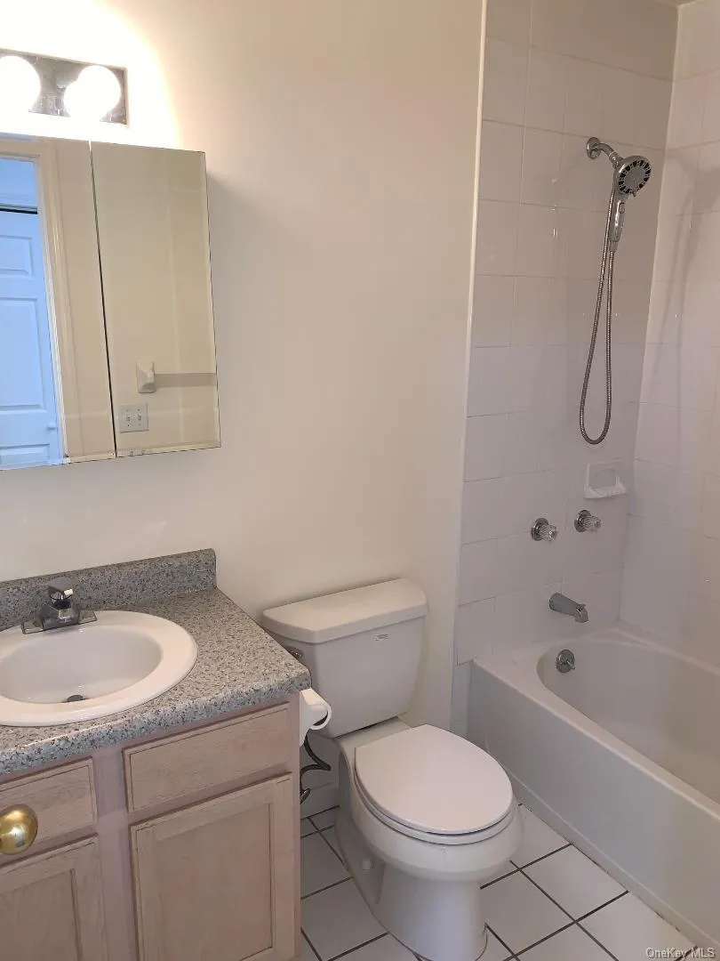 The 2nd full bath is located in the upstairs hallway and features a shower/tub combination The 2nd full bath is located in the upstairs hallway and features a shower/tub combination