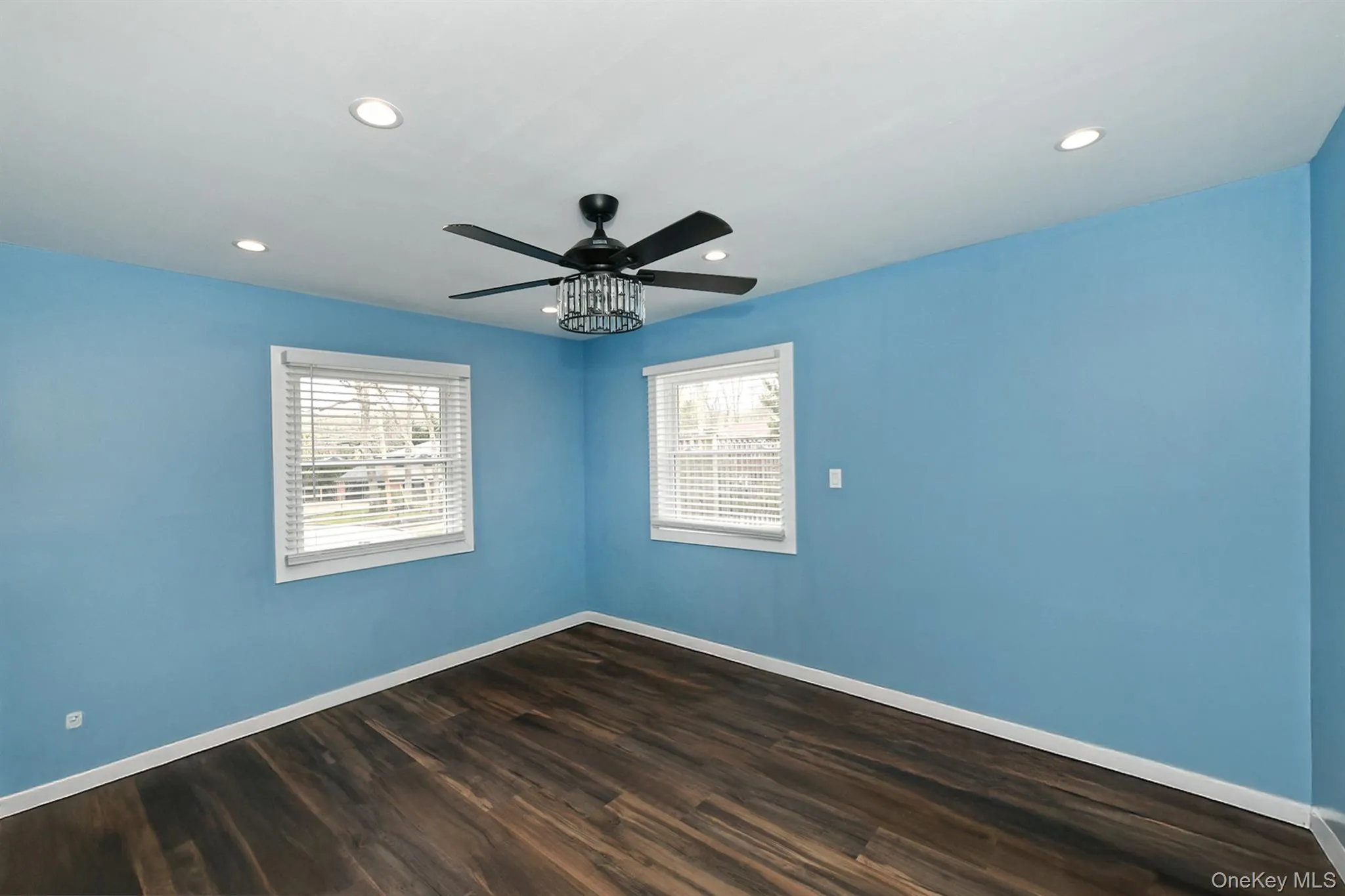 Bedroom with ceiling fan and recessed lighting Bedroom with ceiling fan and recessed lighting