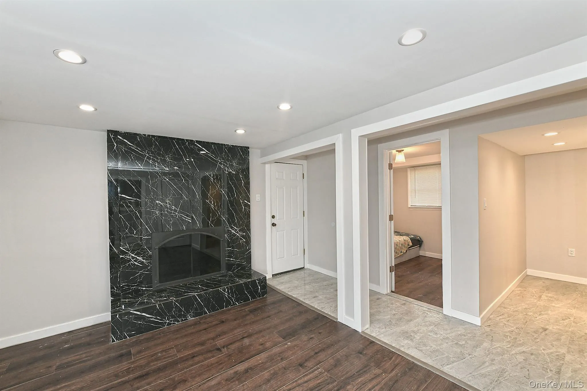 Family room featuring wood burning fireplace and recessed lighting Family room featuring wood burning fireplace and recessed lighting