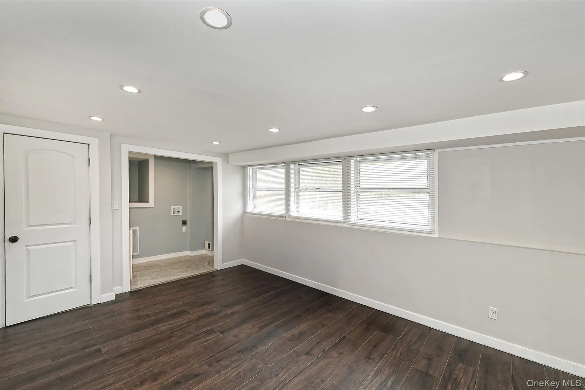 Family room with access to laundry area Family room with access to laundry area