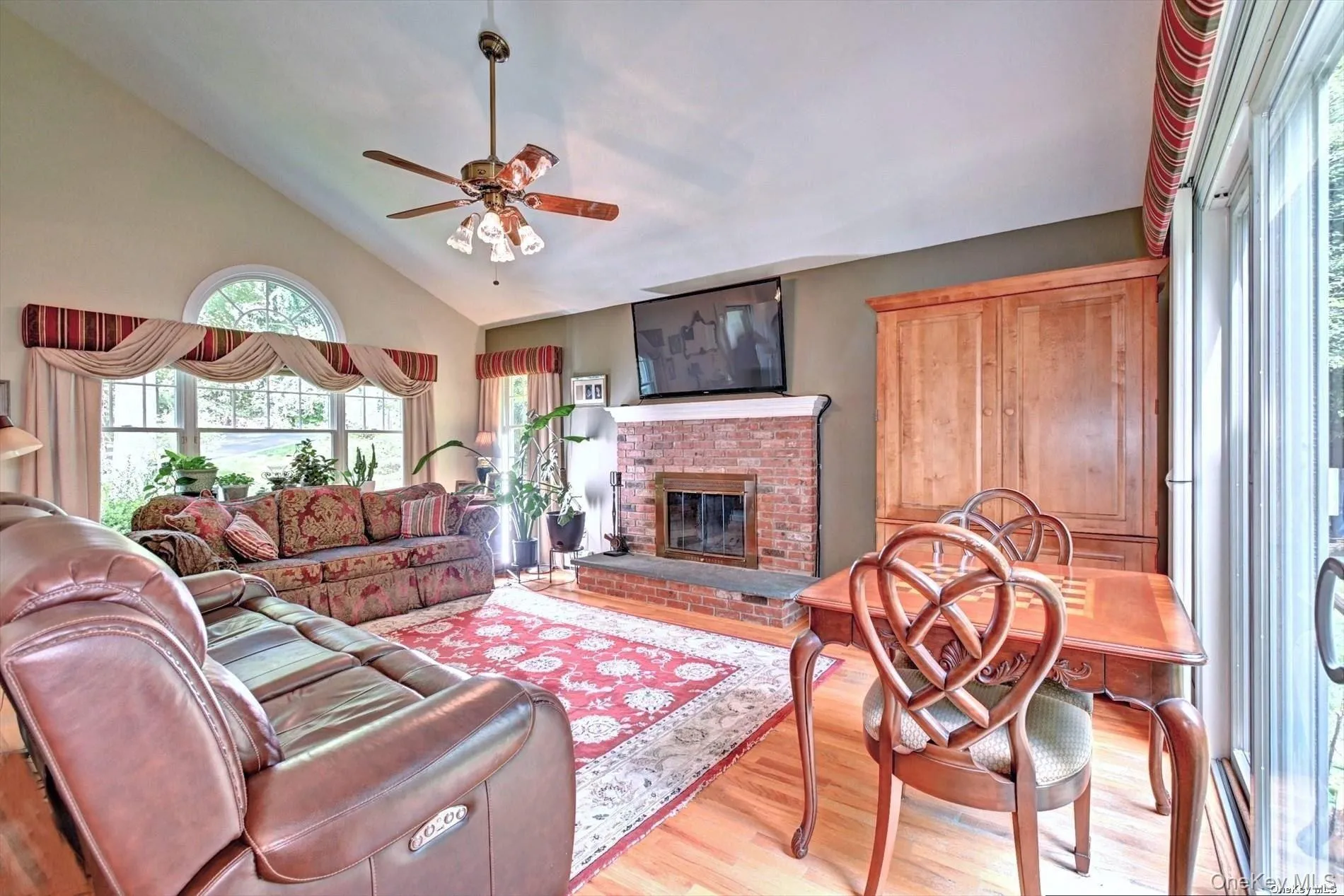 Living Room with wood Burning Fireplace. Living Room with wood Burning Fireplace.