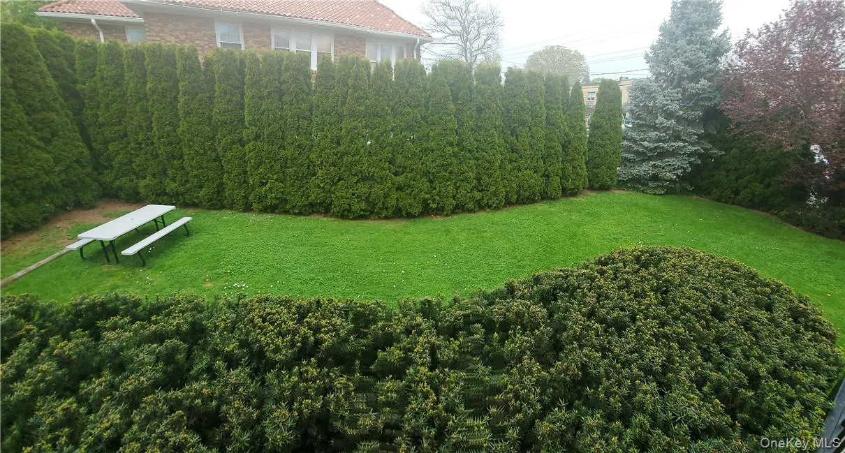 Lush and large beautifully manicured yard maintained by Landlord. Lush and large beautifully manicured yard maintained by Landlord.