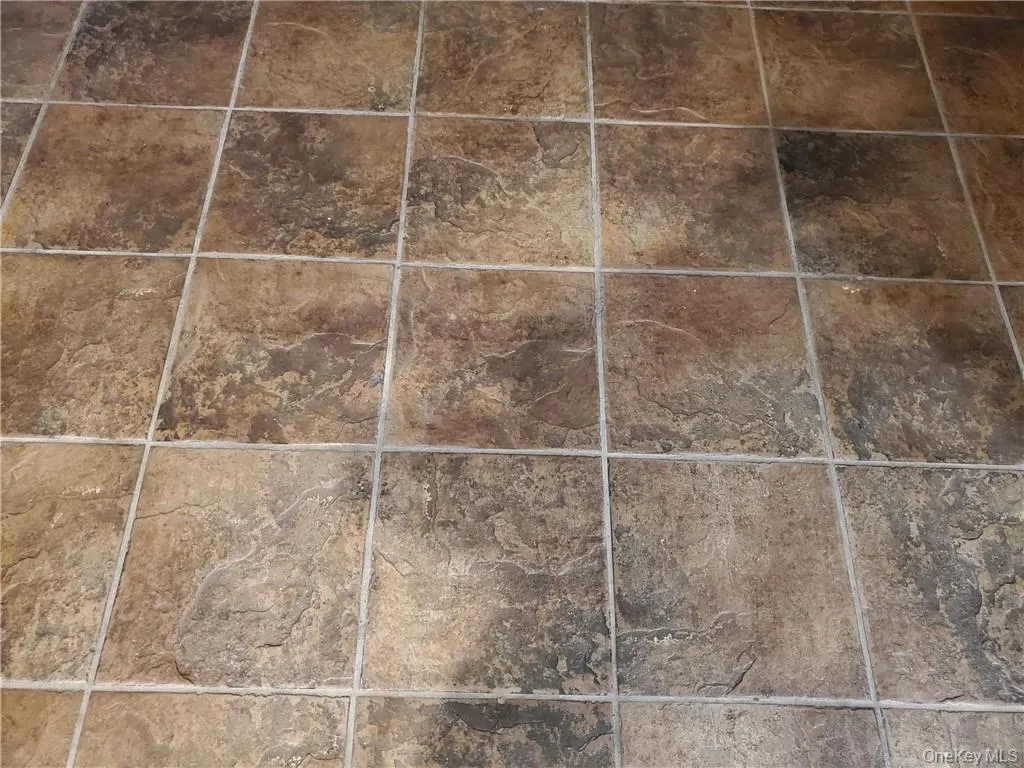 Beautiful lower level tiled floors. Beautiful lower level tiled floors.
