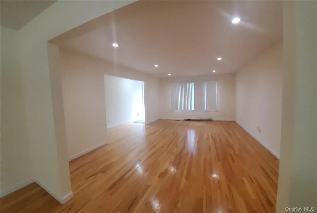 Extra - Large Living room with recessed lighting. Extra - Large Living room with recessed lighting.