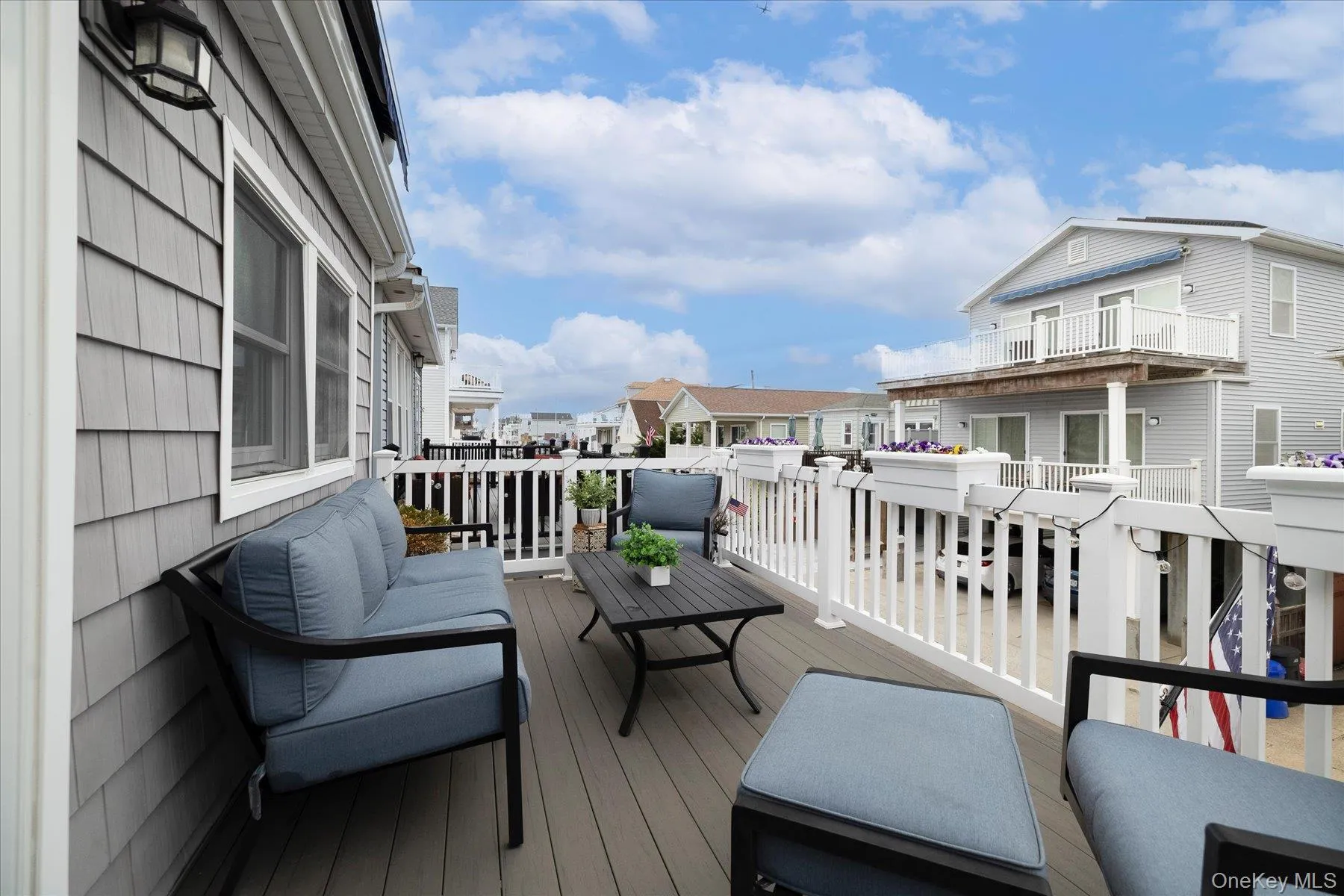 Alternate View of Spacious Front Deck with Awning Alternate View of Spacious Front Deck with Awning
