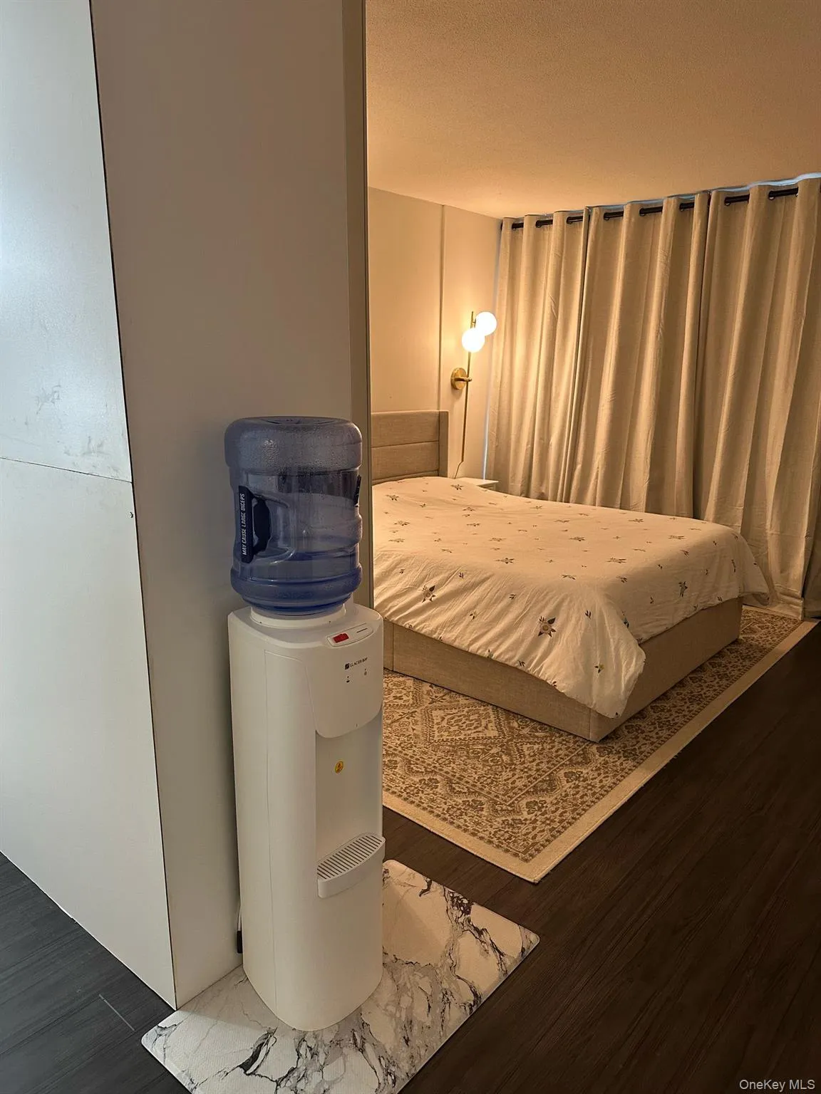 Bedroom featuring wood finished floors Bedroom featuring wood finished floors