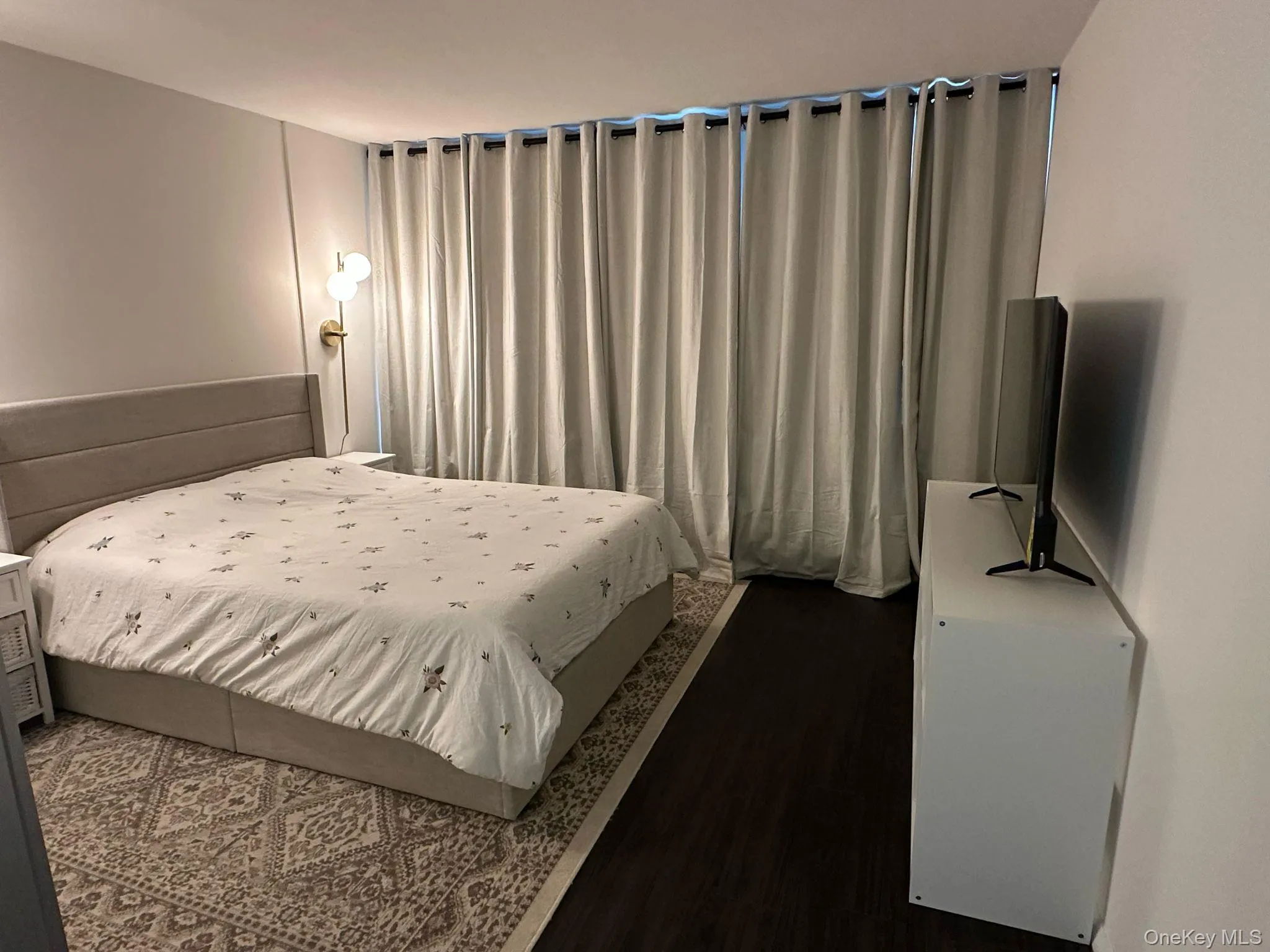 Bedroom with wood finished floors Bedroom with wood finished floors