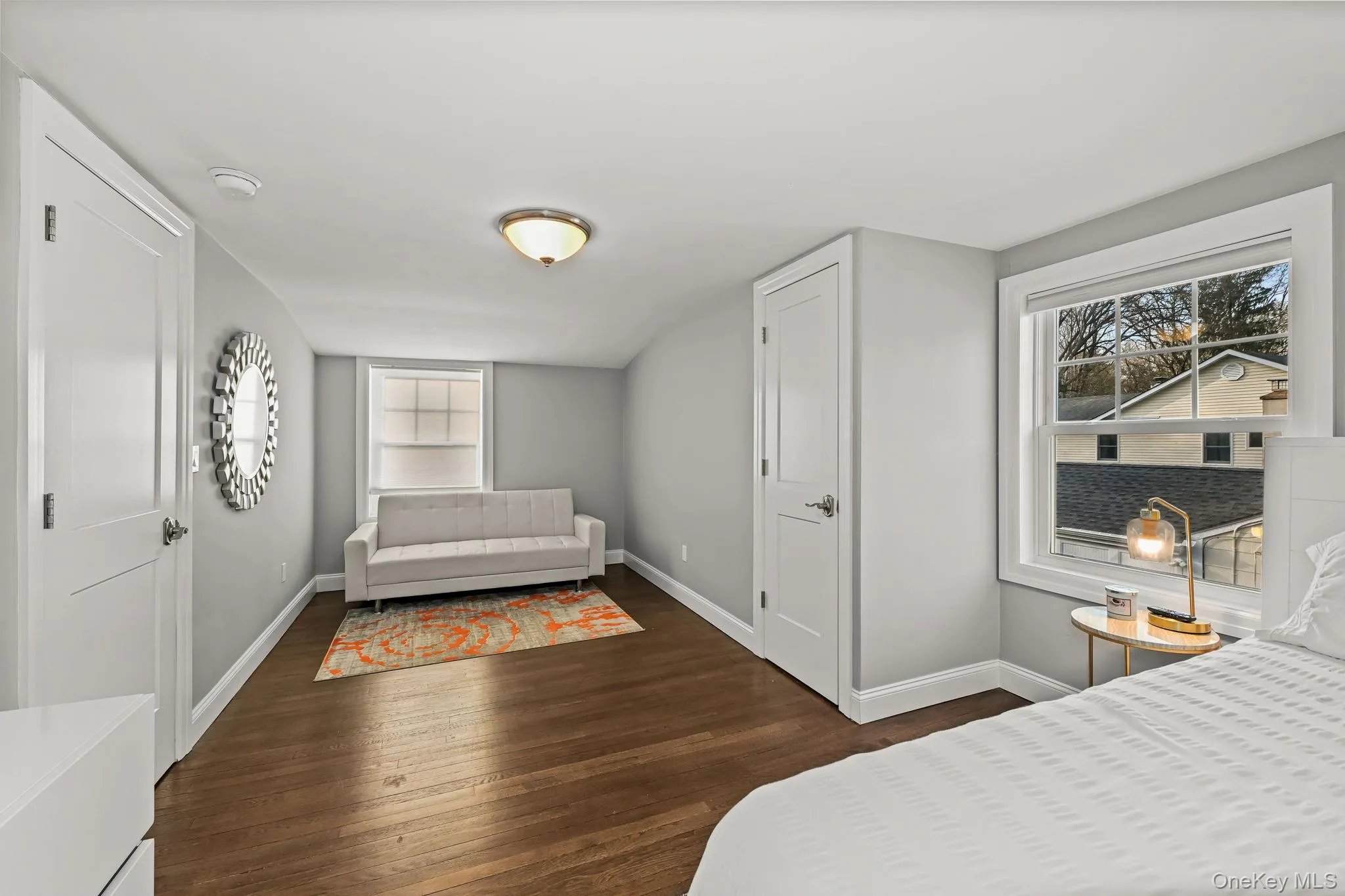 Bright and spacious, this inviting room showcases beautiful hardwood flooring that adds warmth and timeless appeal. Bright and spacious, this inviting room showcases beautiful hardwood flooring that adds warmth and timeless appeal.