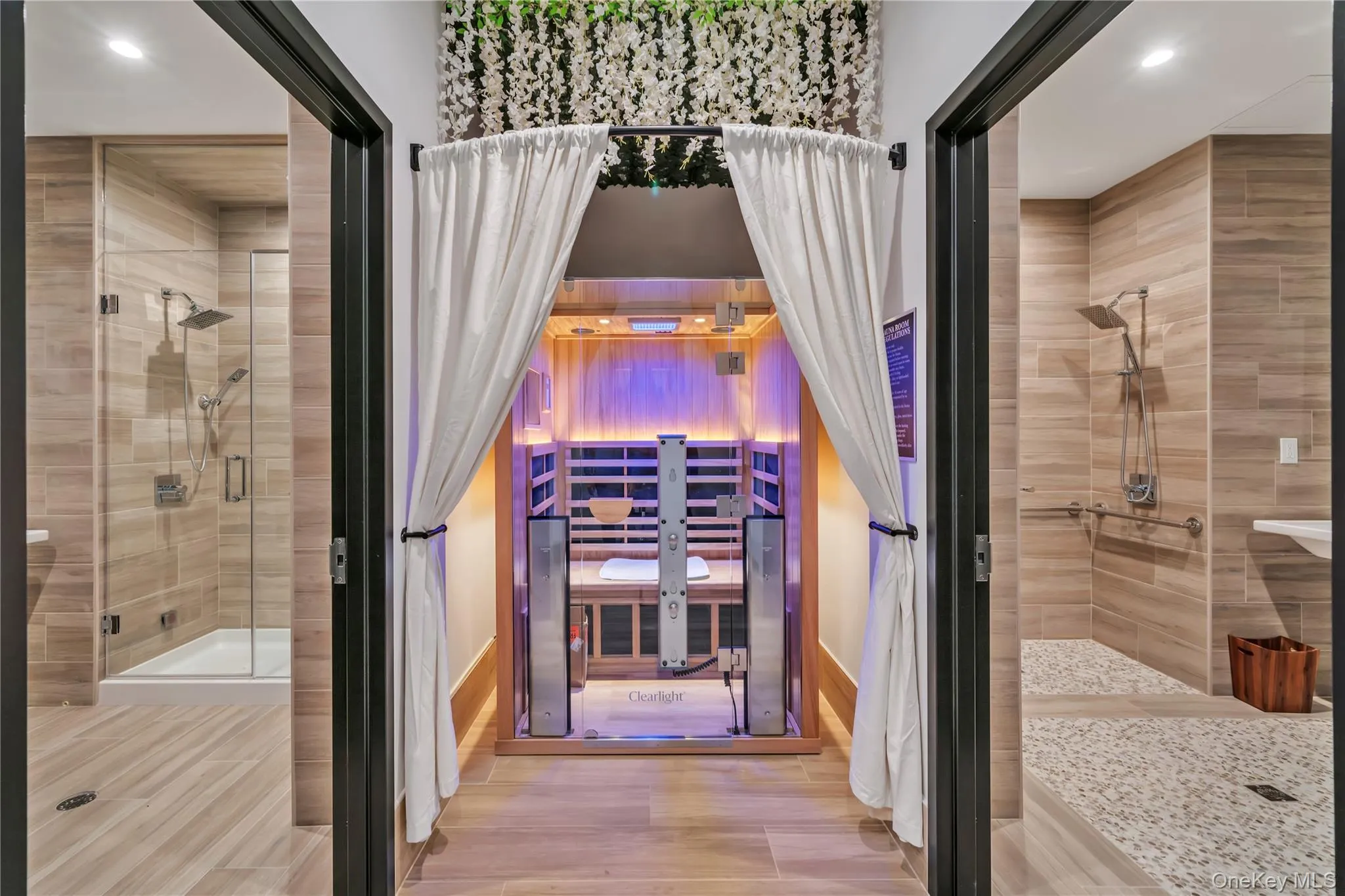 Bathroom with recessed lighting, a stall shower, baseboards, and wood finished floors Bathroom with recessed lighting, a stall shower, baseboards, and wood finished floors