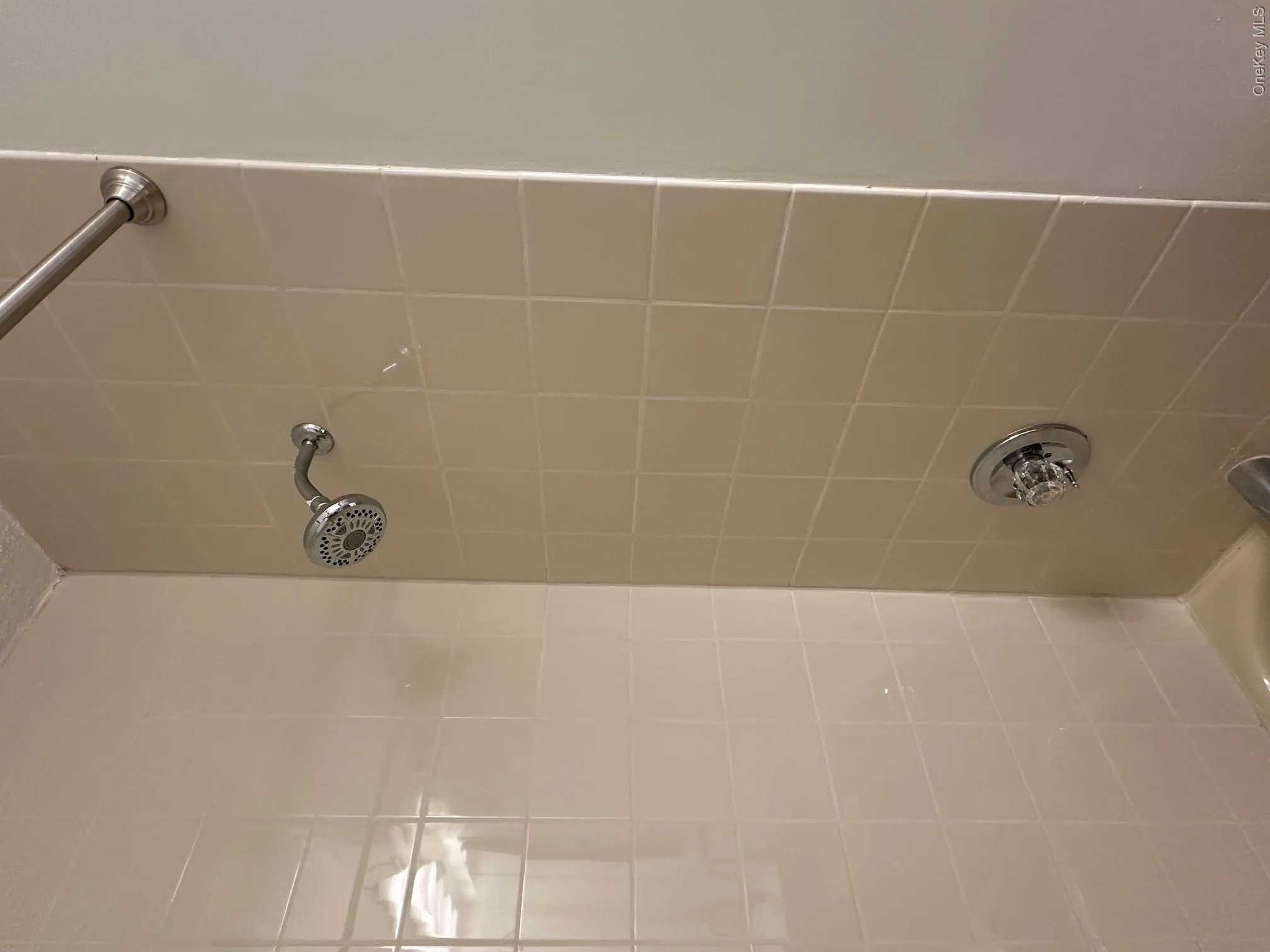 Bathroom with shower / bathing tub combination Bathroom with shower / bathing tub combination