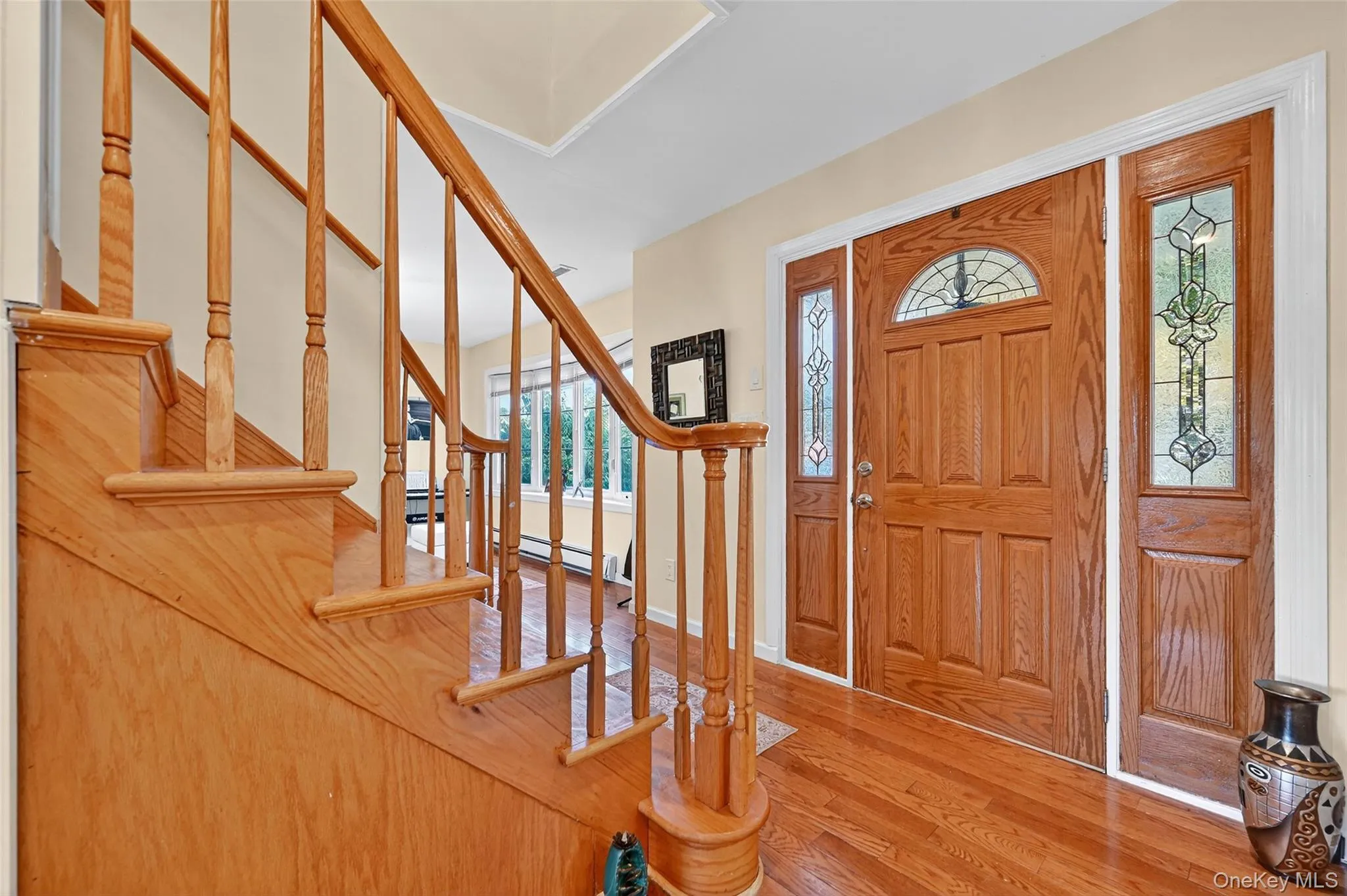 Entrance foyer with wood finished floors Entrance foyer with wood finished floors