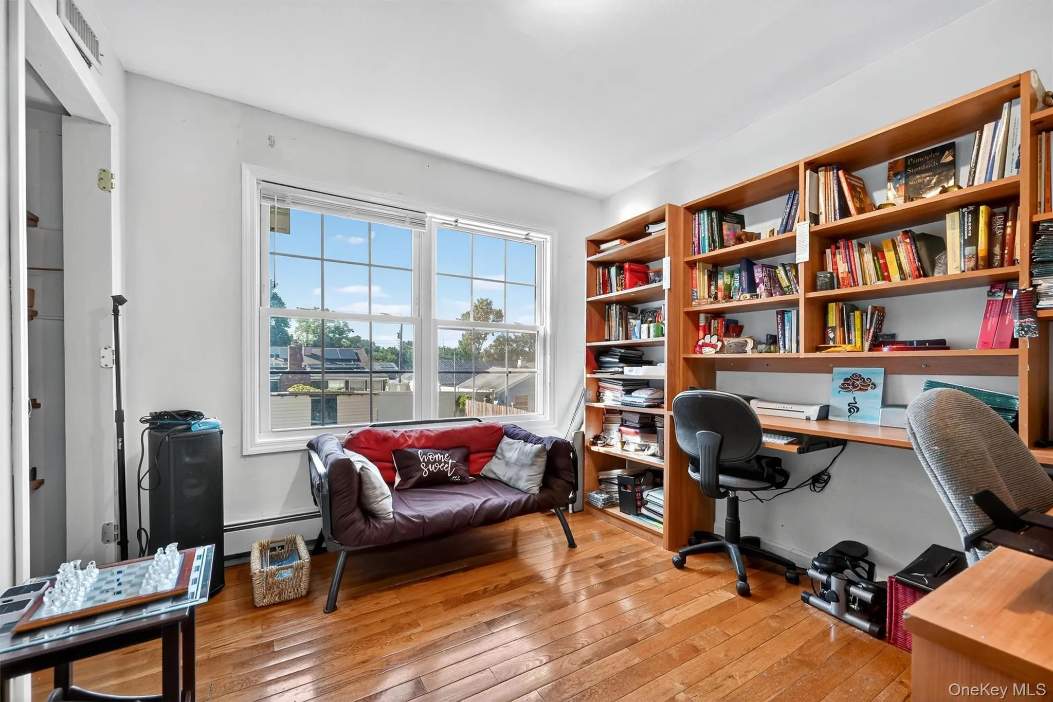 Featuring light wood-style floors, baseboard heating Featuring light wood-style floors, baseboard heating