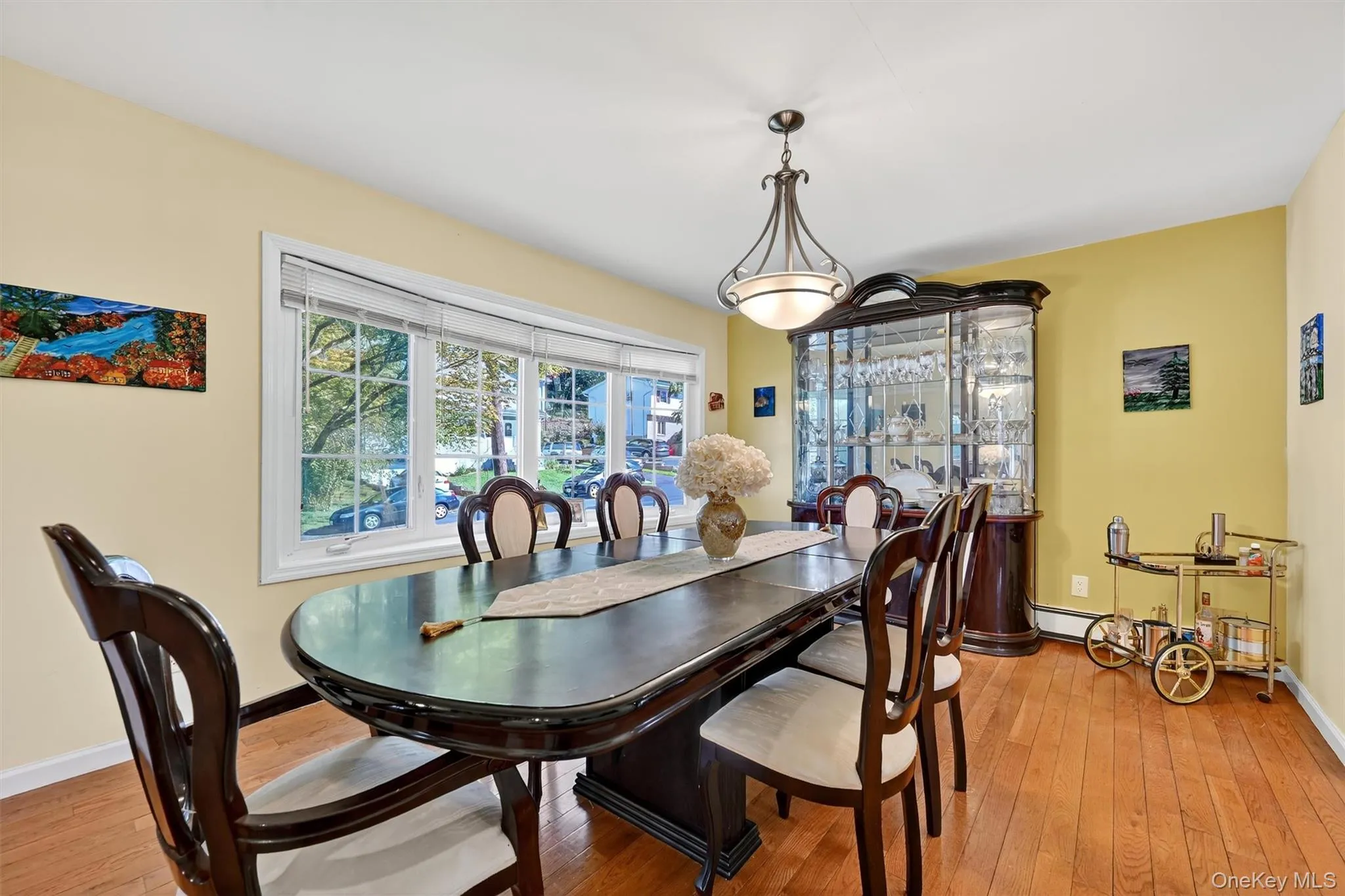 Dining room with wood finished floors Dining room with wood finished floors