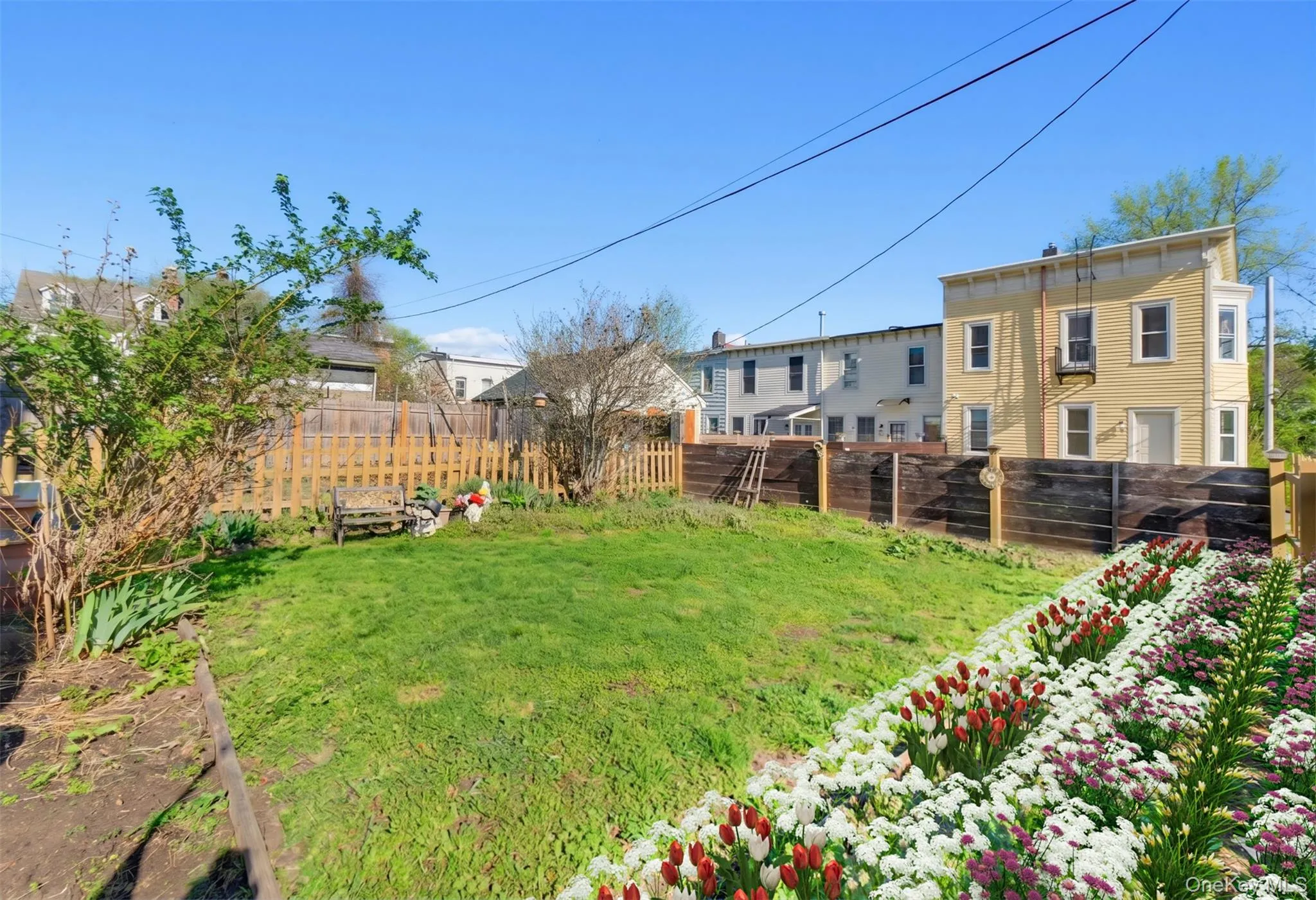 Spacious, fenced-in backyard offering plenty of room for outdoor enjoyment, gardening, or entertaining. Spacious, fenced-in backyard offering plenty of room for outdoor enjoyment, gardening, or entertaining.