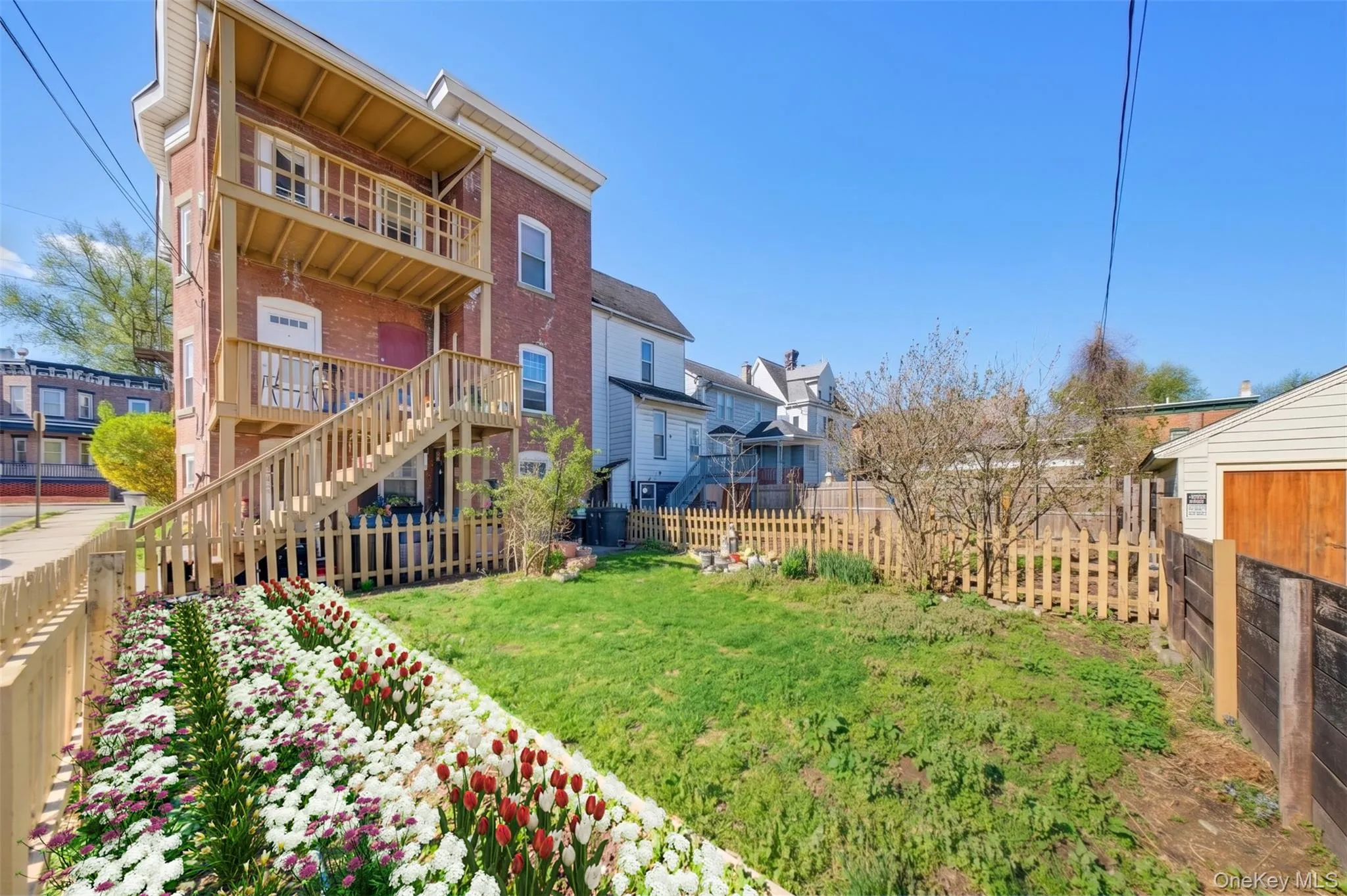 Expansive fenced backyard with beautiful garden beds and space to enjoy outdoor living. Expansive fenced backyard with beautiful garden beds and space to enjoy outdoor living.