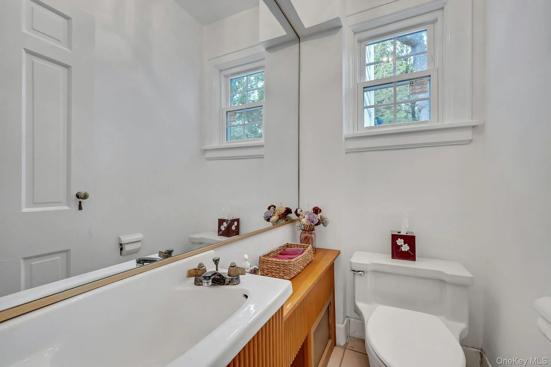 Clean and well-maintained center hall powder room Clean and well-maintained center hall powder room