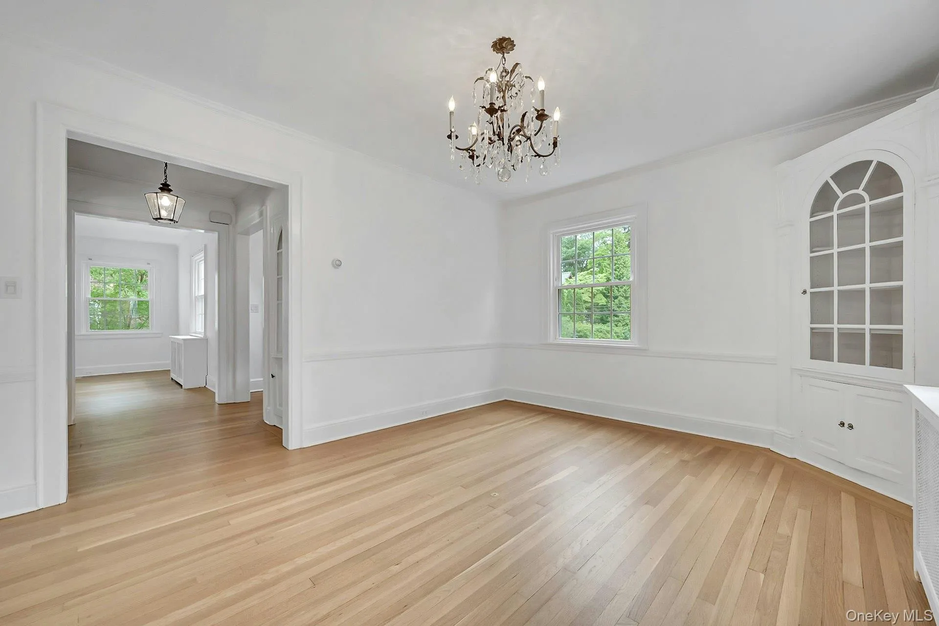 Formal dining room with sightline to center hall foyer Formal dining room with sightline to center hall foyer