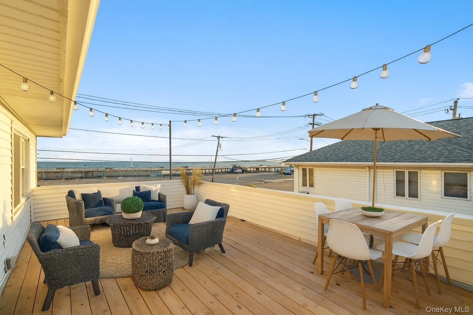Second Floor Sun Deck with Ocean Views Virtually Staged Second Floor Sun Deck with Ocean Views Virtually Staged