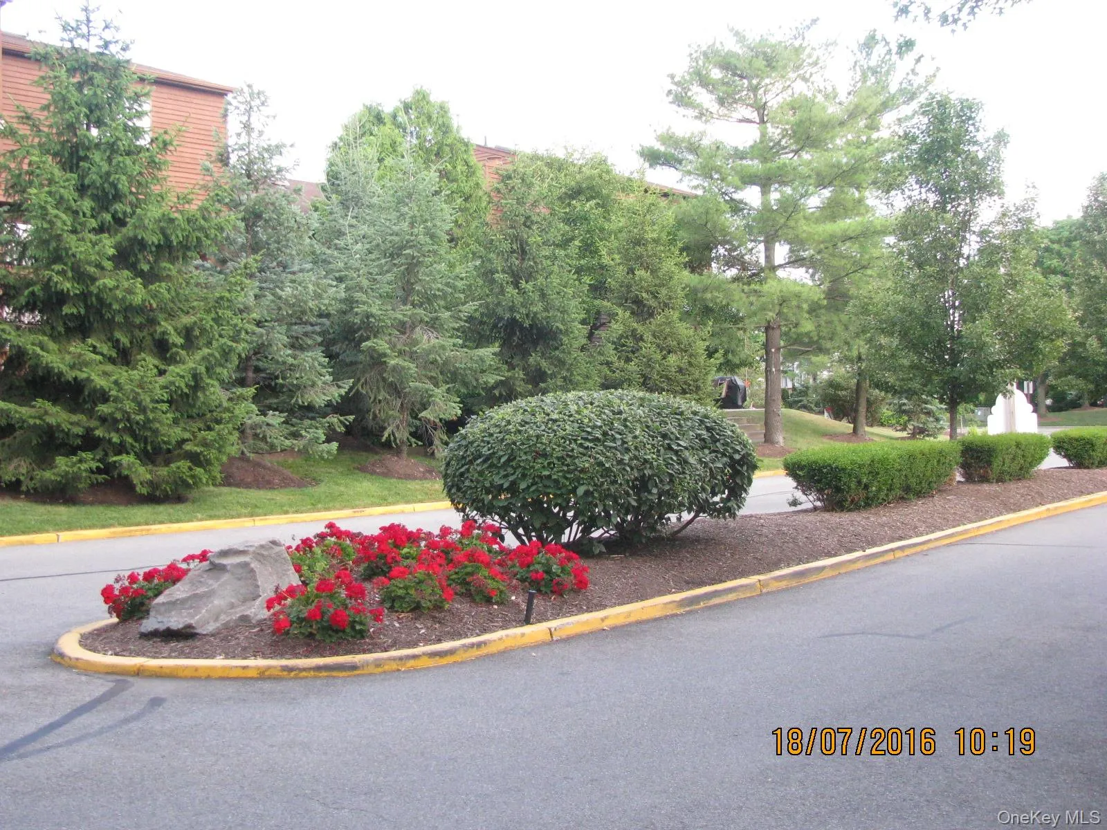 Beautifully landscaped entry way to the Community Beautifully landscaped entry way to the Community