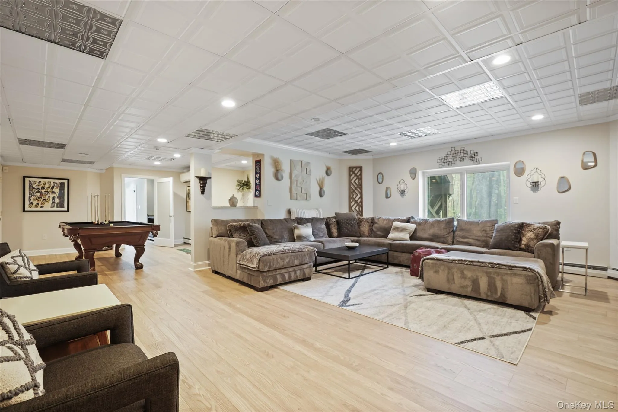 Spectacular lower level with double sliding doors to the outside. Spectacular lower level with double sliding doors to the outside.