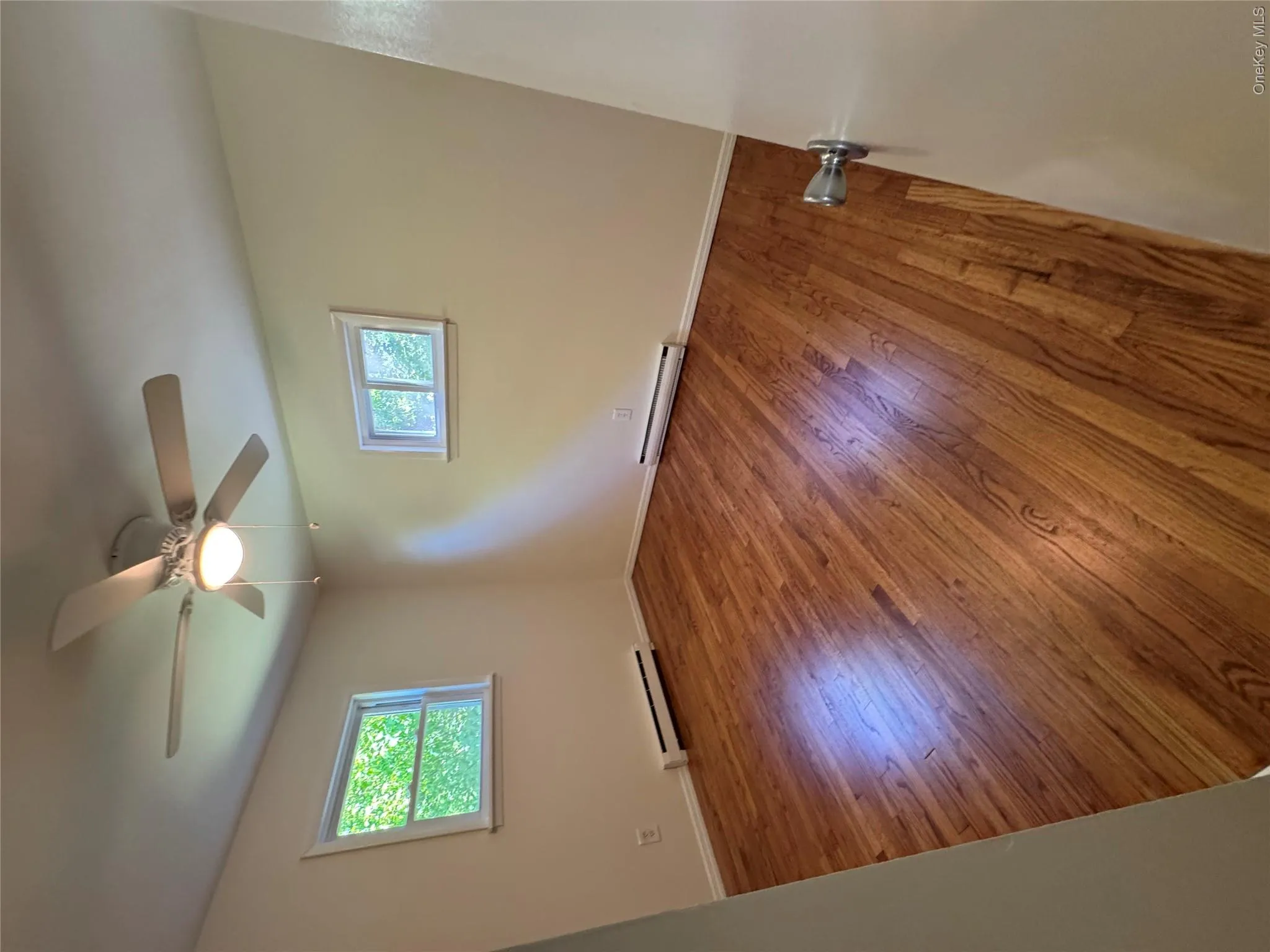 The bedroom faces the backyard , offering quietness. The bedroom faces the backyard , offering quietness.