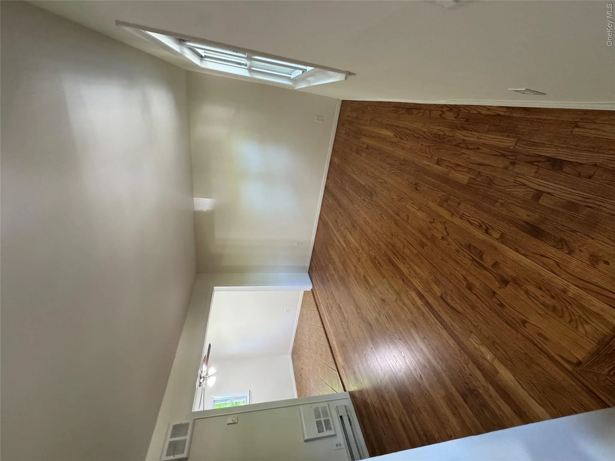 The living room is bright and spacious and it has an open concept connecting the dining area and the Kitchen The living room is bright and spacious and it has an open concept connecting the dining area and the Kitchen