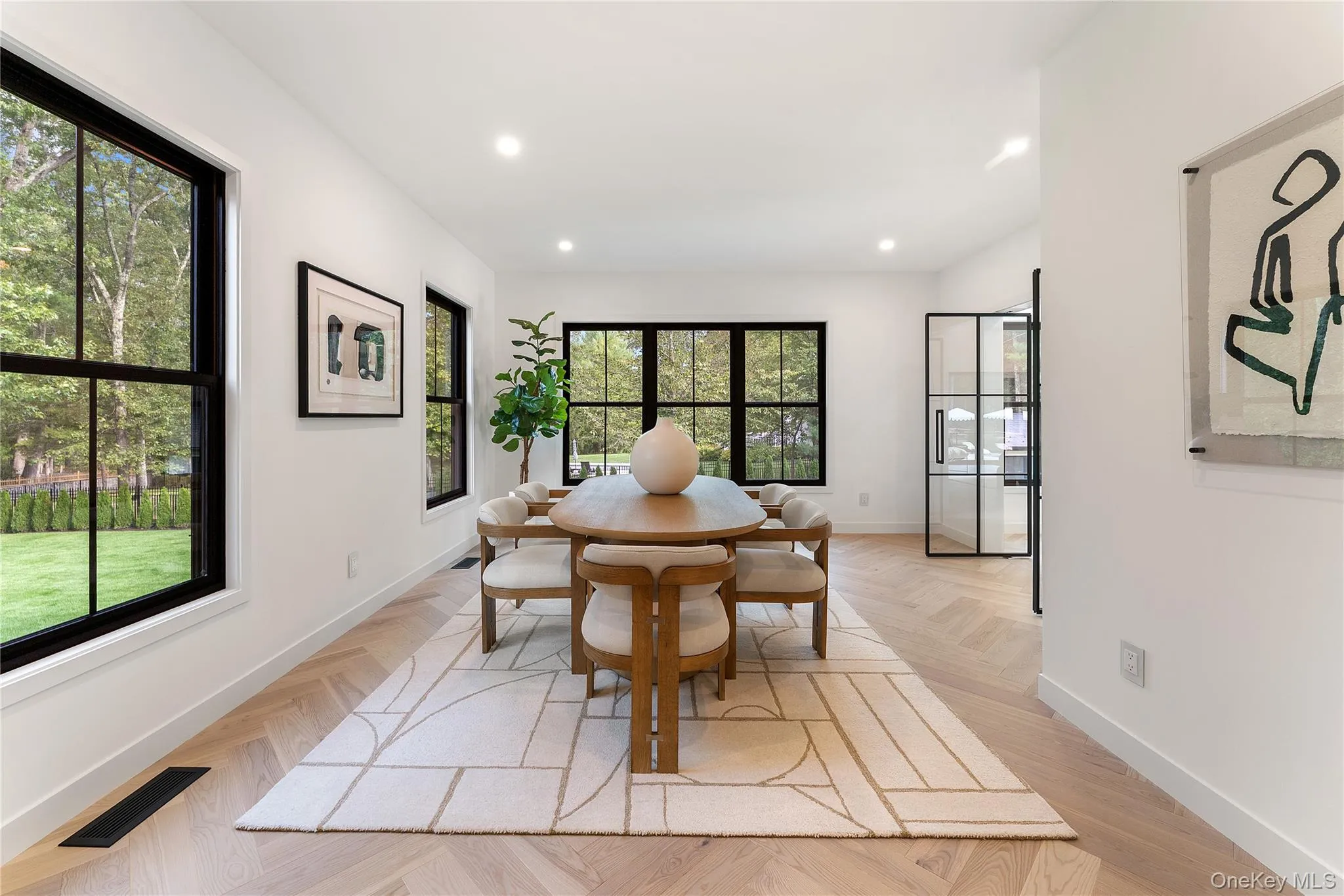 Dining area featuring baseboards and recessed lighting Dining area featuring baseboards and recessed lighting