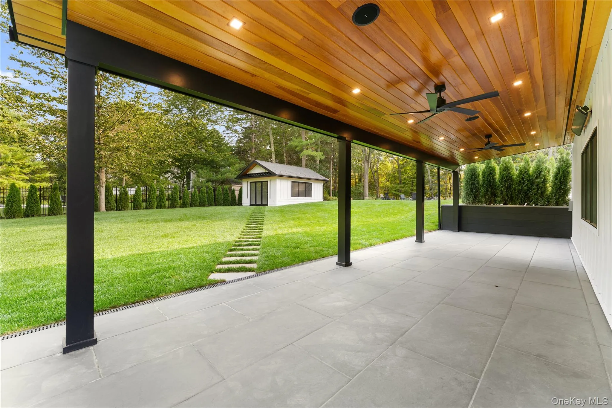 View of patio featuring an outdoor structure View of patio featuring an outdoor structure