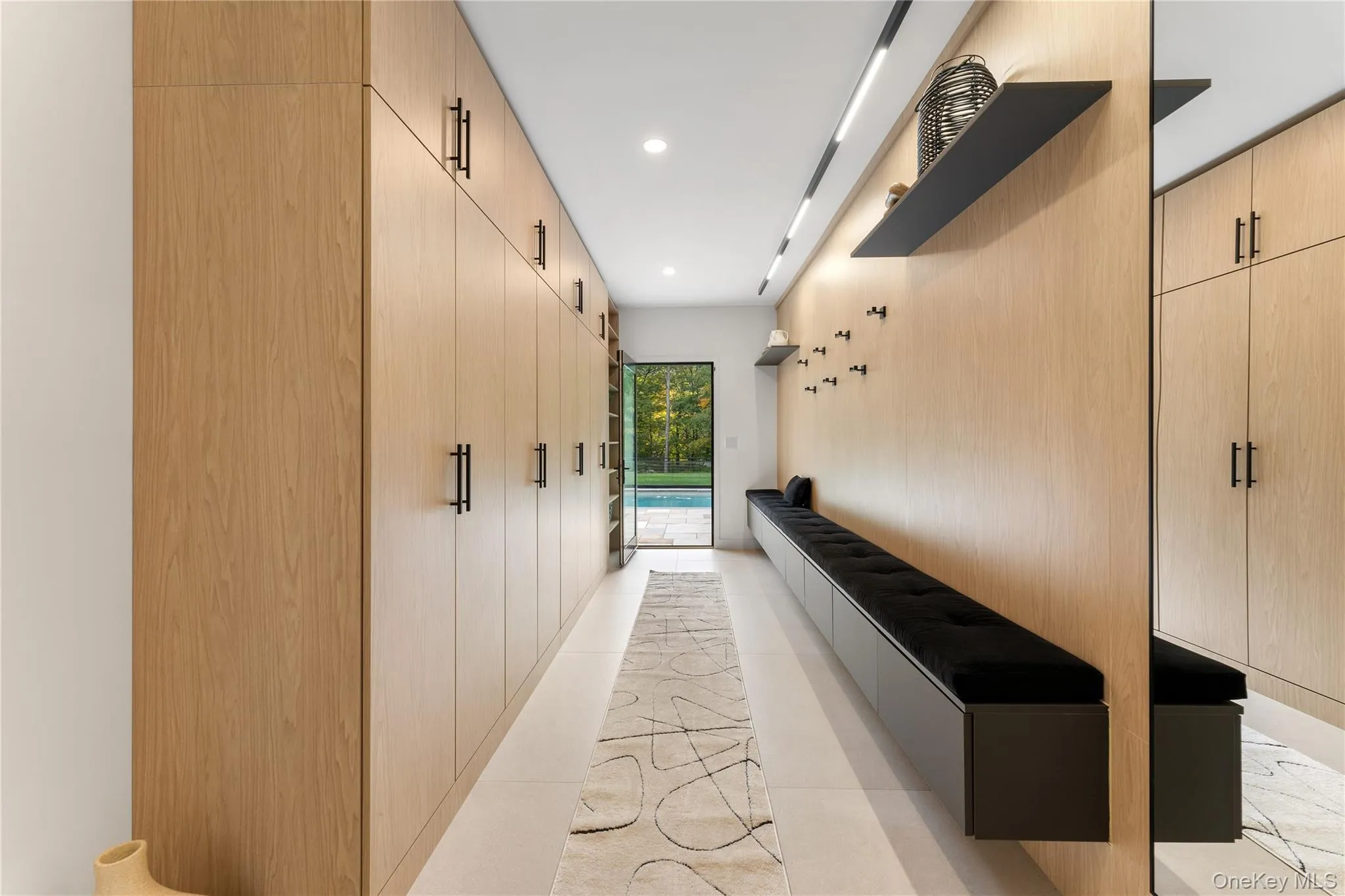 Mudroom leading from the pool featuring recessed lighting Mudroom leading from the pool featuring recessed lighting