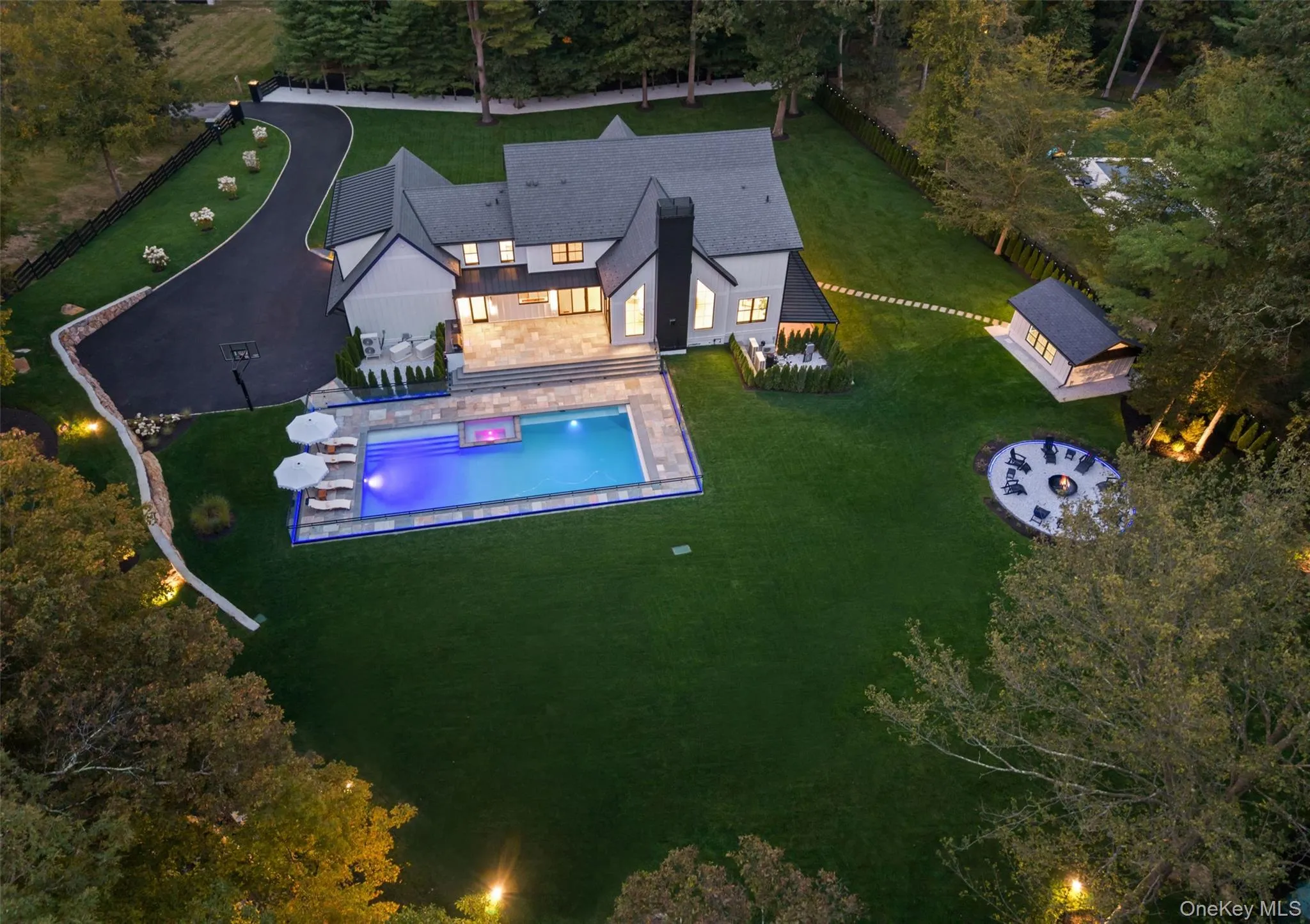 View from above of property with a pool area View from above of property with a pool area