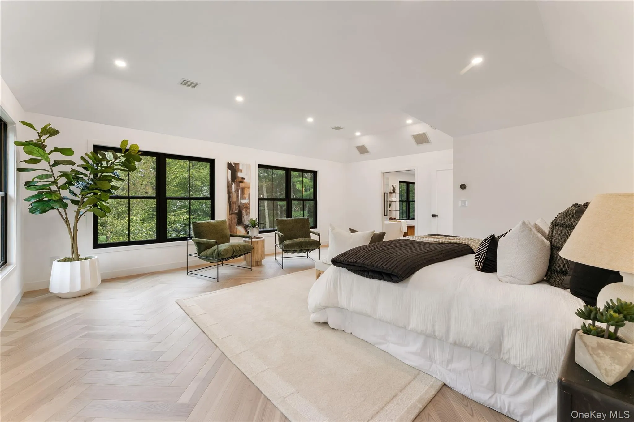 Bedroom featuring recessed lighting and lofted ceiling Bedroom featuring recessed lighting and lofted ceiling