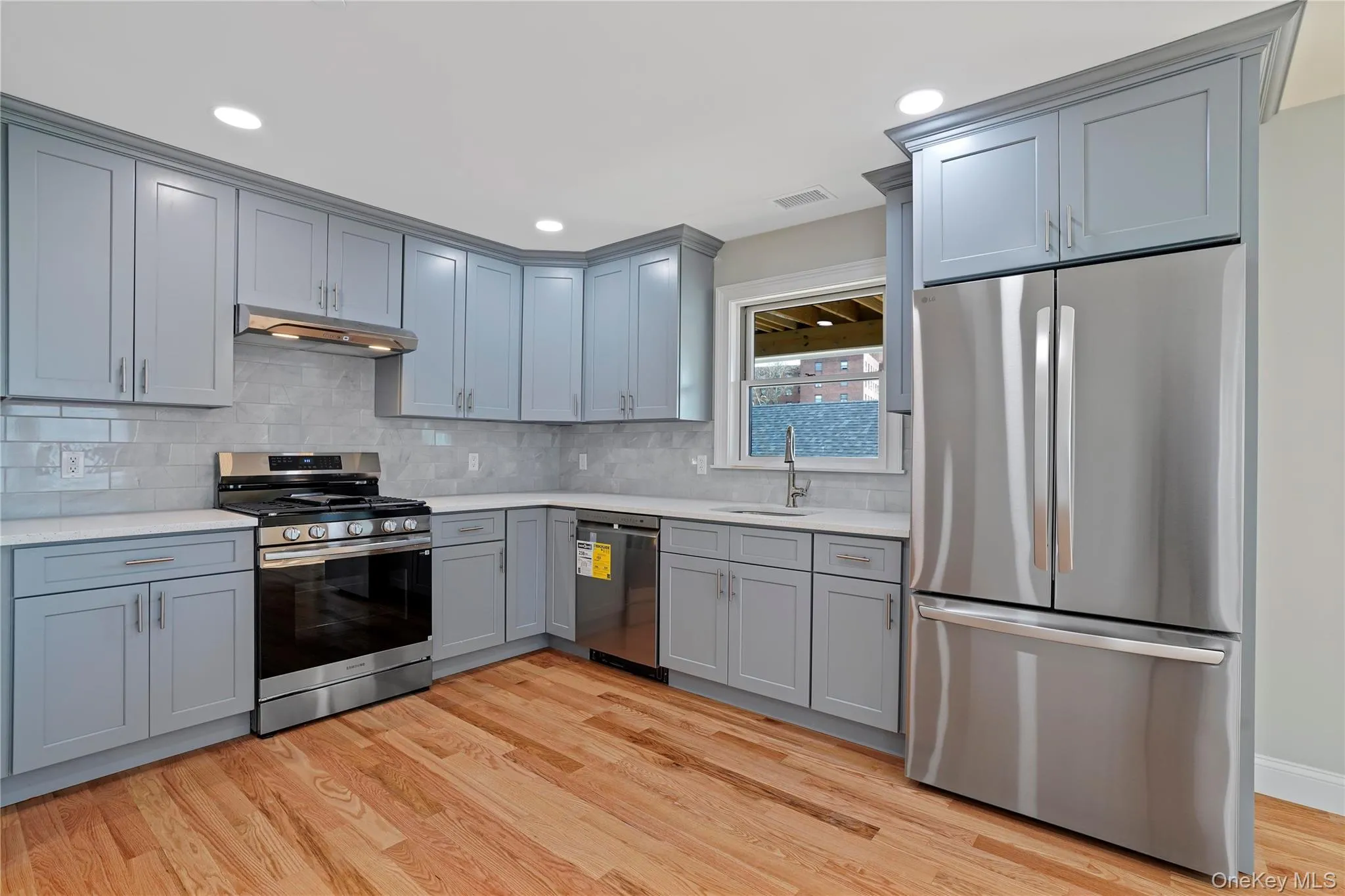 Beautiful new kitchen with stainless steel appliances. Beautiful new kitchen with stainless steel appliances.
