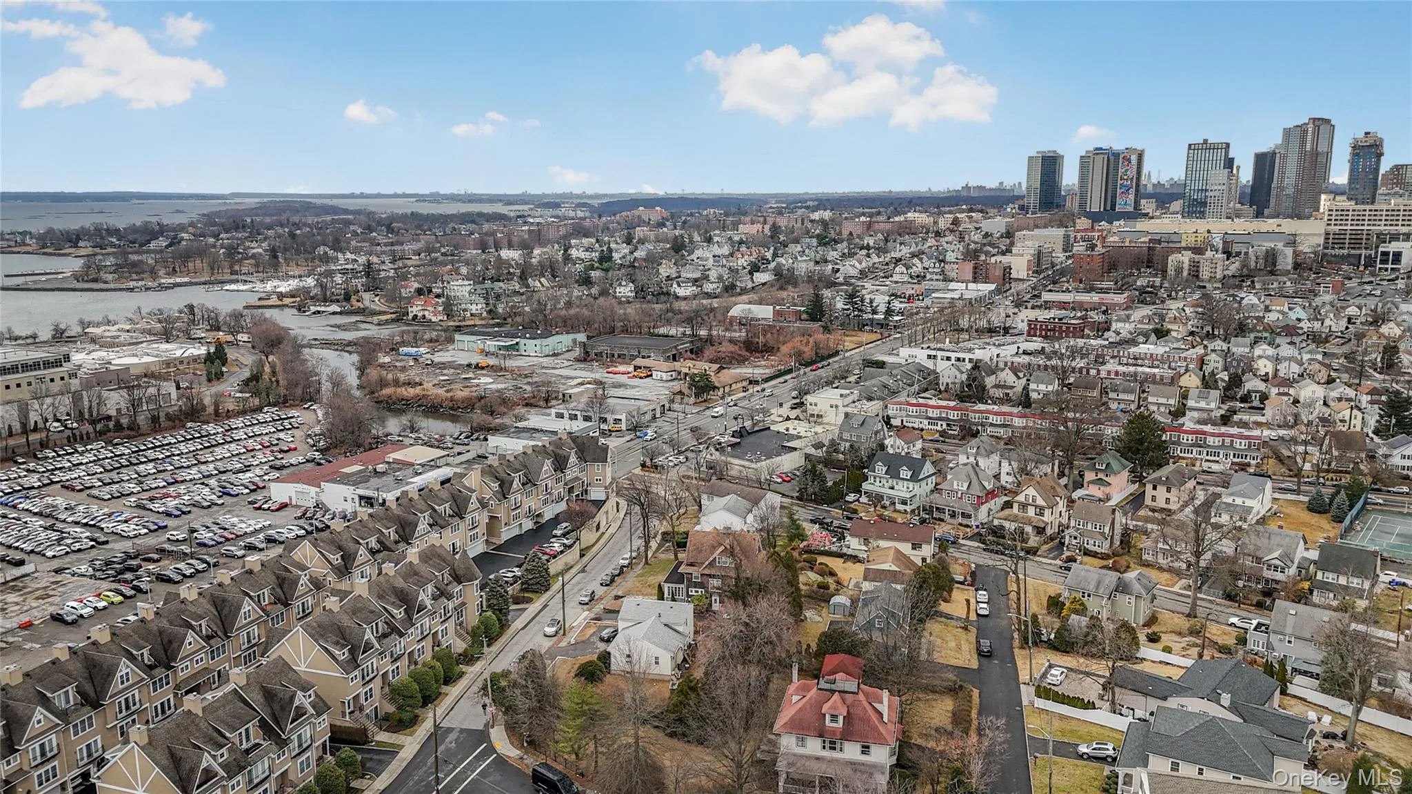 Hugeuenot Hills condominium facing South to downtown New Rochelle and NYC Skyline on the horizon Hugeuenot Hills condominium facing South to downtown New Rochelle and NYC Skyline on the horizon