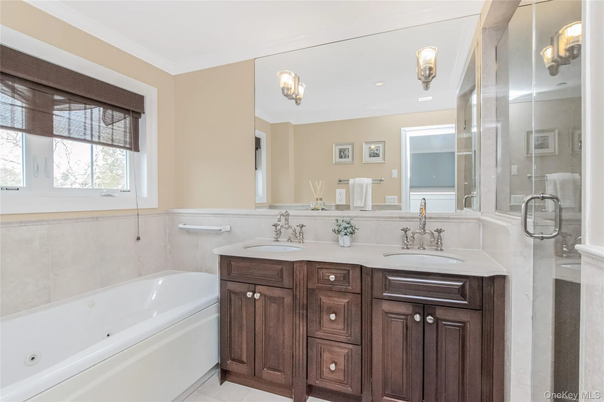 Primary bathroom with jacuzzi tub and shower Primary bathroom with jacuzzi tub and shower