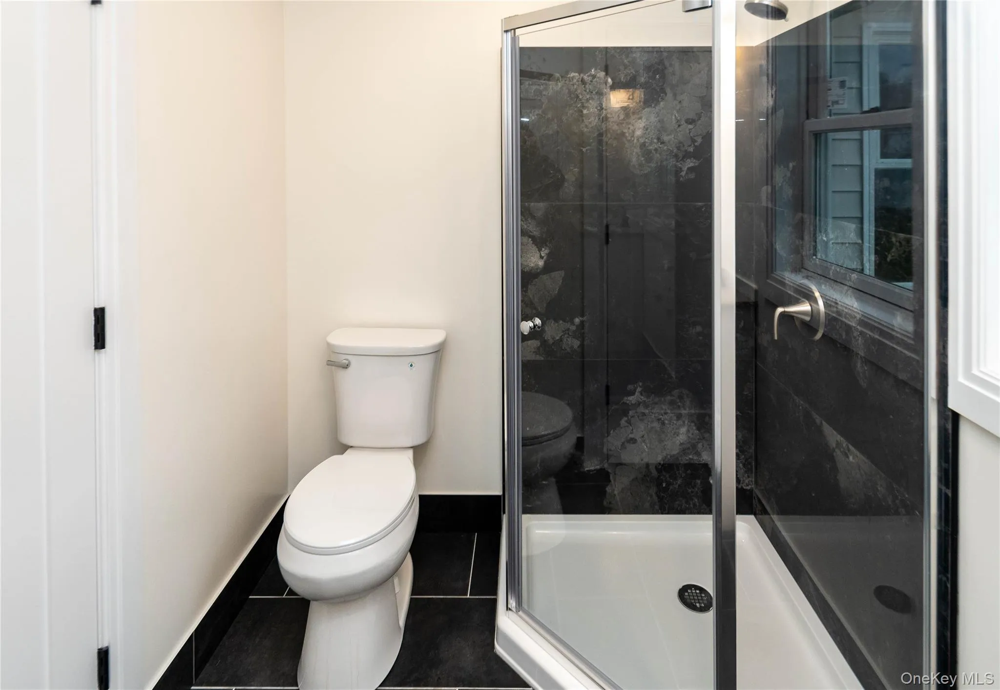 Main Level Bathroom with access for business/office space. Main Level Bathroom with access for business/office space.