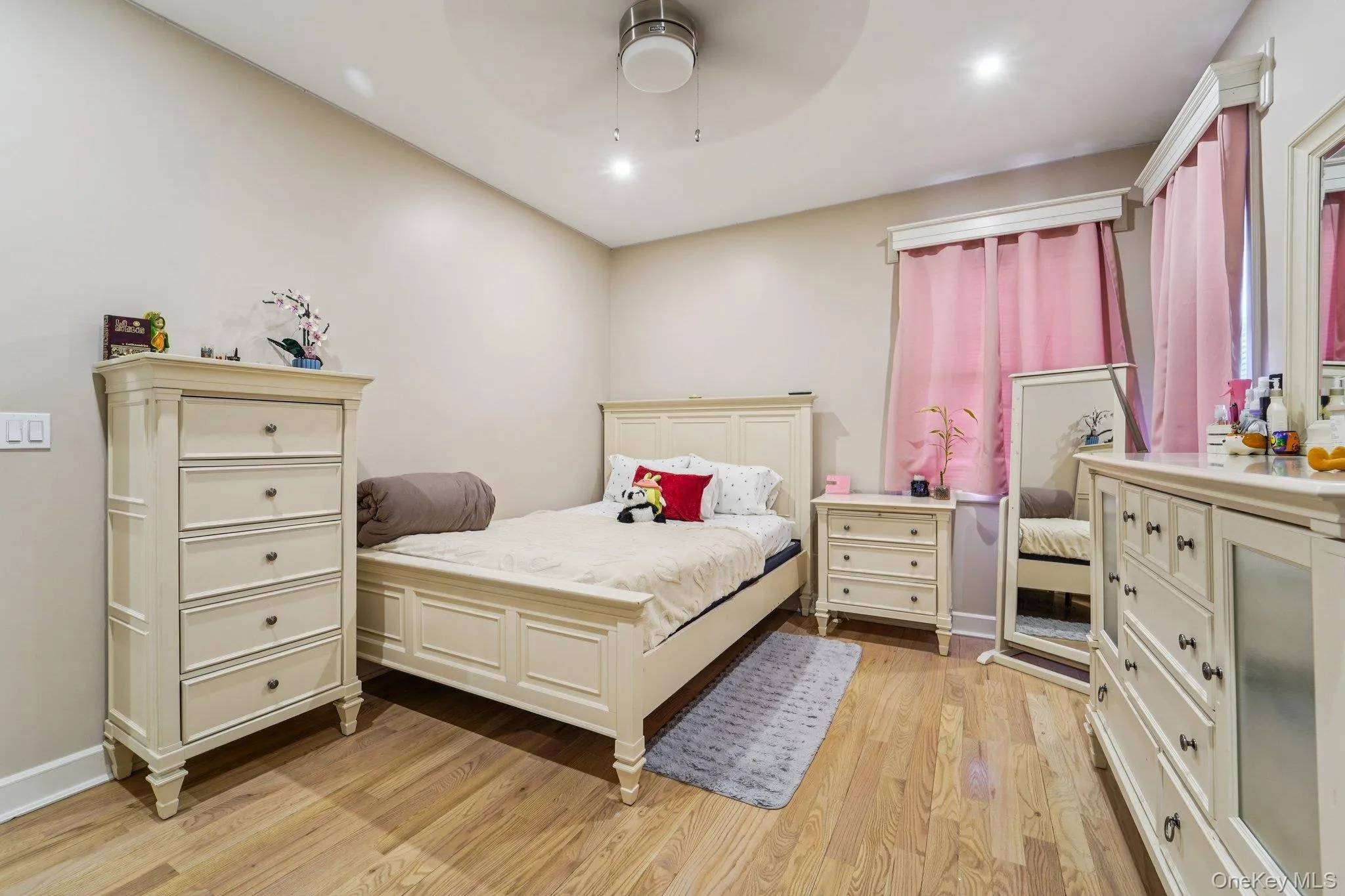 Bedroom 3: This room features light hardwood flooring, recessed lighting, and a ceiling fan. Bedroom 3: This room features light hardwood flooring, recessed lighting, and a ceiling fan.