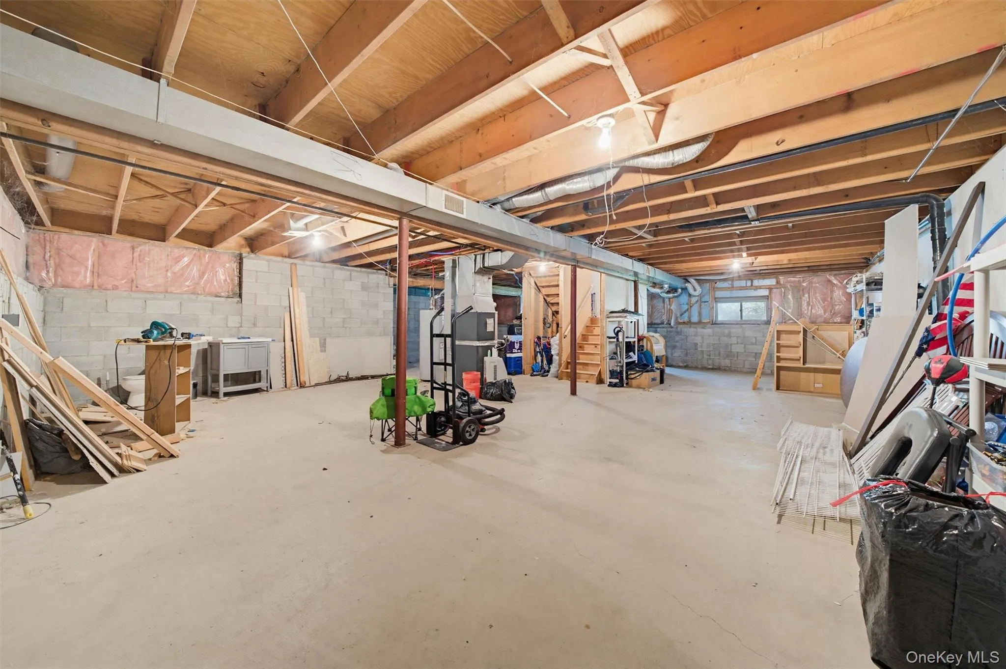 The property features an unfinished basement with a concrete floor, The property features an unfinished basement with a concrete floor,