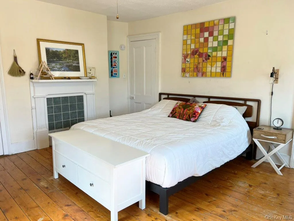 Bedroom with hardwood / wood-style floors Bedroom with hardwood / wood-style floors