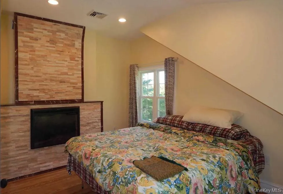 En Suite 3 with fireplace, walk in closet En Suite 3 with fireplace, walk in closet