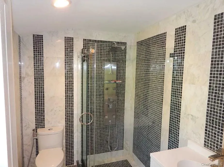 Single sink vanity with stall shower glass enty Single sink vanity with stall shower glass enty