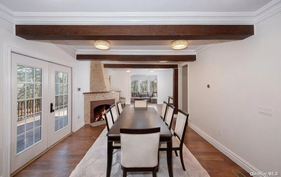 Formal Diing Room with French doors to deck with another fireplace Formal Diing Room with French doors to deck with another fireplace