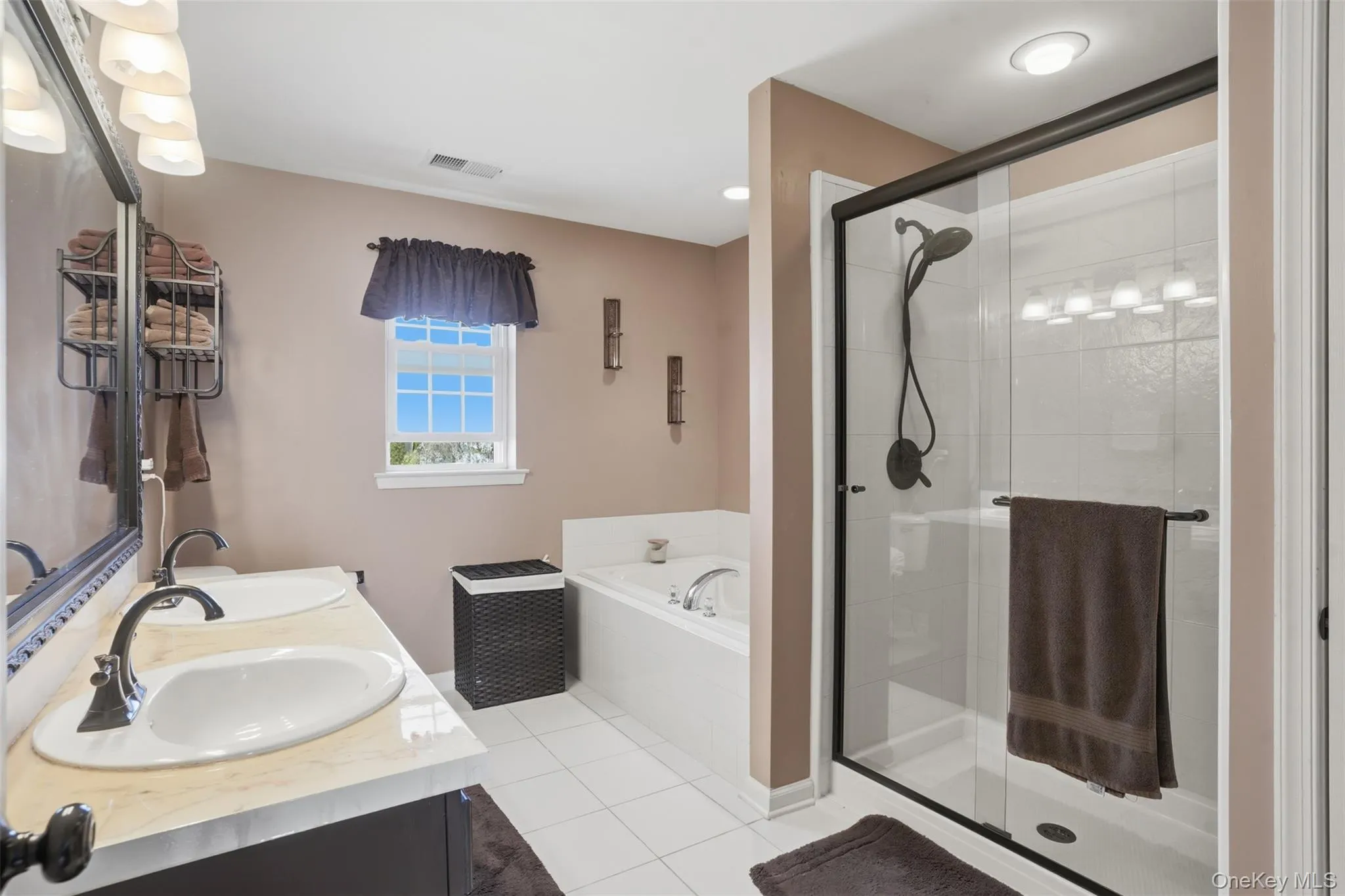 Primary ensuite featuring tastefully updated shower Primary ensuite featuring tastefully updated shower