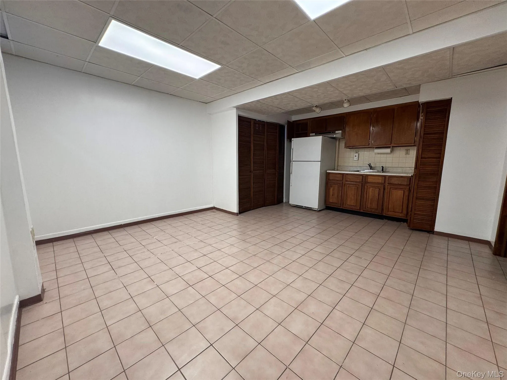 Open Space in the basement, great for gathering or entertainment room Open Space in the basement, great for gathering or entertainment room