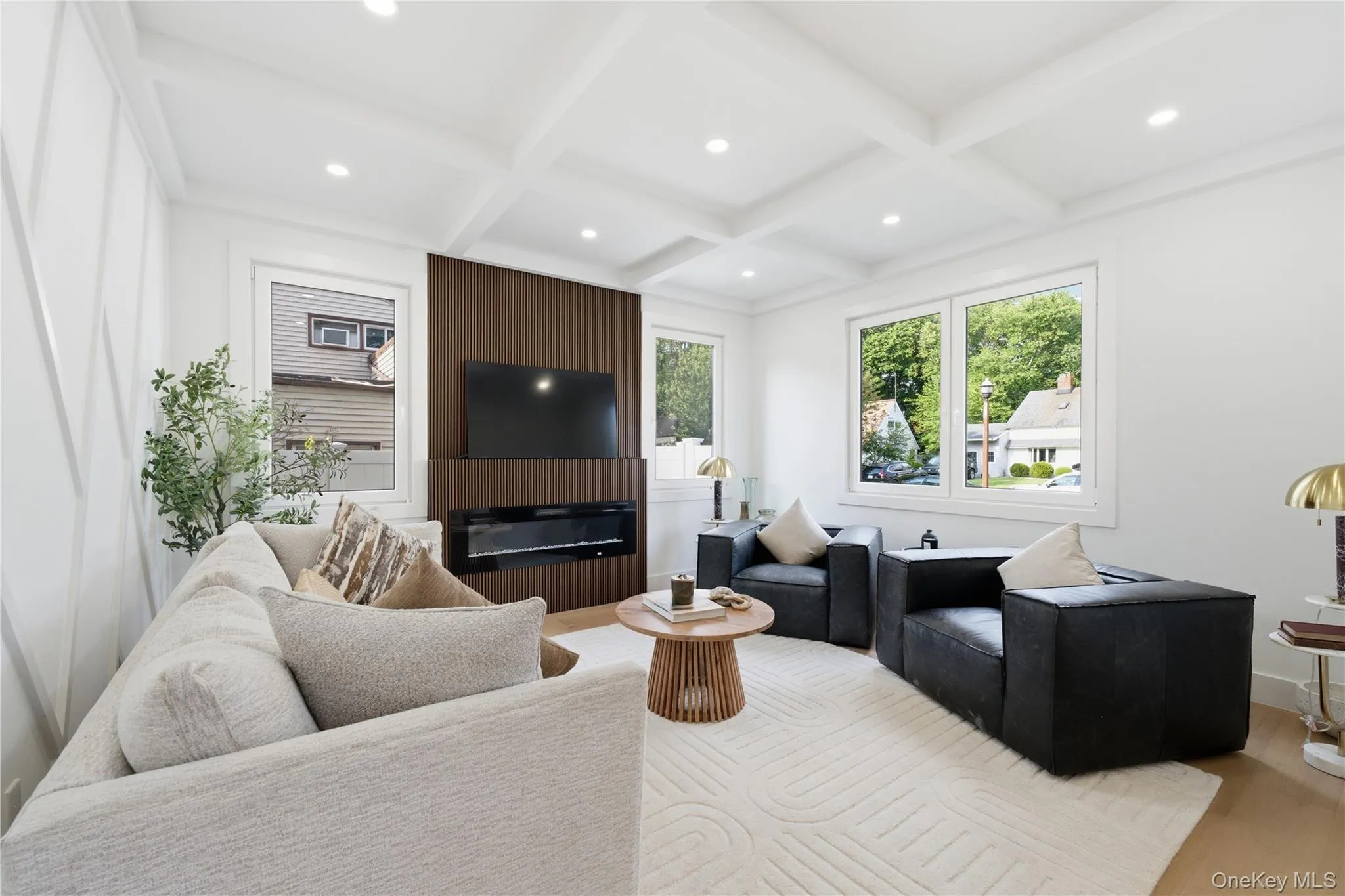 Cozy, light and bright FAMILY ROOM with custom fireplace and full custom wainscoting wall! Cozy, light and bright FAMILY ROOM with custom fireplace and full custom wainscoting wall!