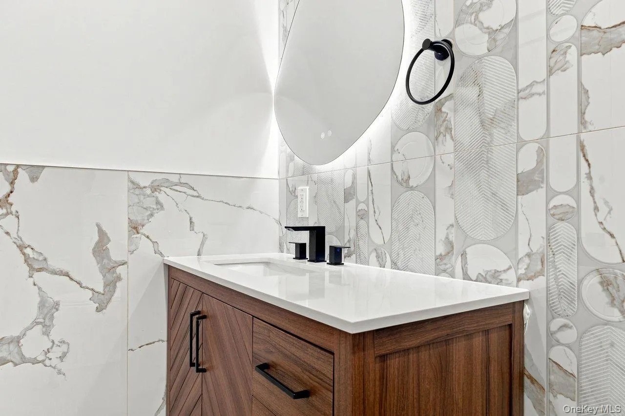 Half bath on 1st floor for guests Half bath on 1st floor for guests