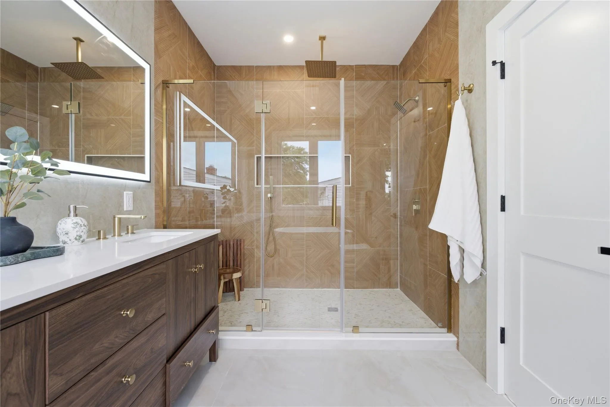 Custom glass with rainshower head! Enjoy this spa style shower in primary bathroom. Custom glass with rainshower head! Enjoy this spa style shower in primary bathroom.