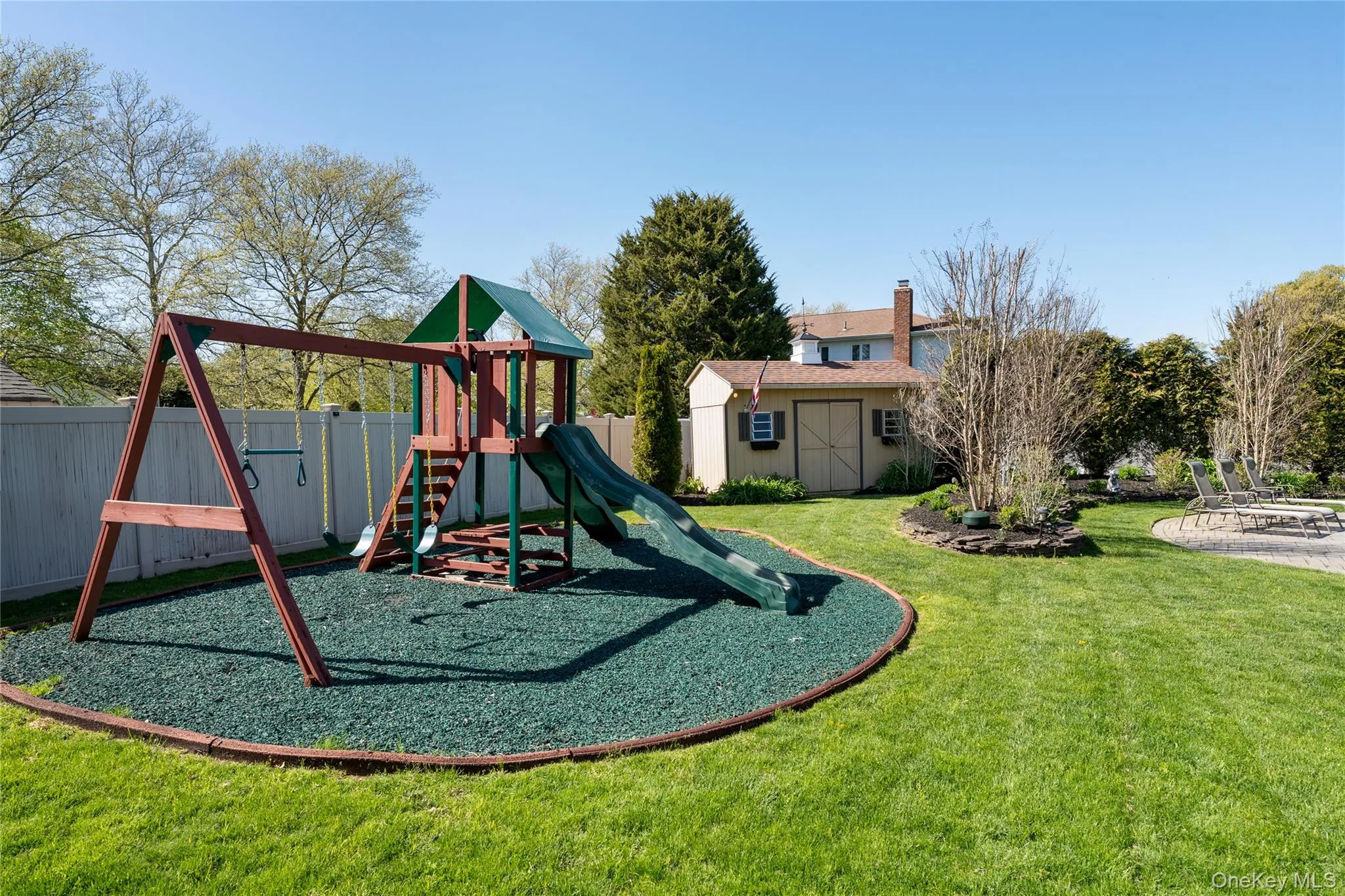 Plenty of room to roam in the fenced yard with patios and decks Plenty of room to roam in the fenced yard with patios and decks