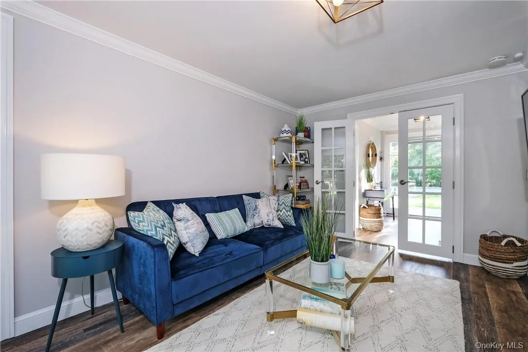 Family room- french doors to foyer. Sliding french doors to back yard. Powder room/ laundry room. Can be used as guest BR/ study/ office space/ playroom. Family room- french doors to foyer. Sliding french doors to back yard. Powder room/ laundry room. Can be used as guest BR/ study/ office space/ playroom.